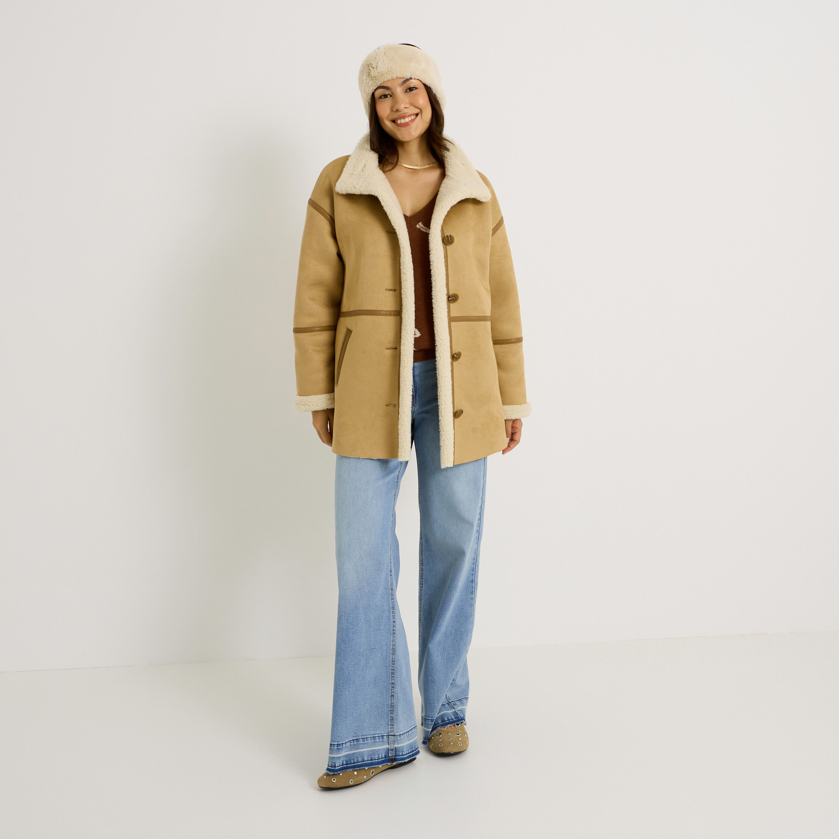 Manteau effet peau lain&eacute;e femme