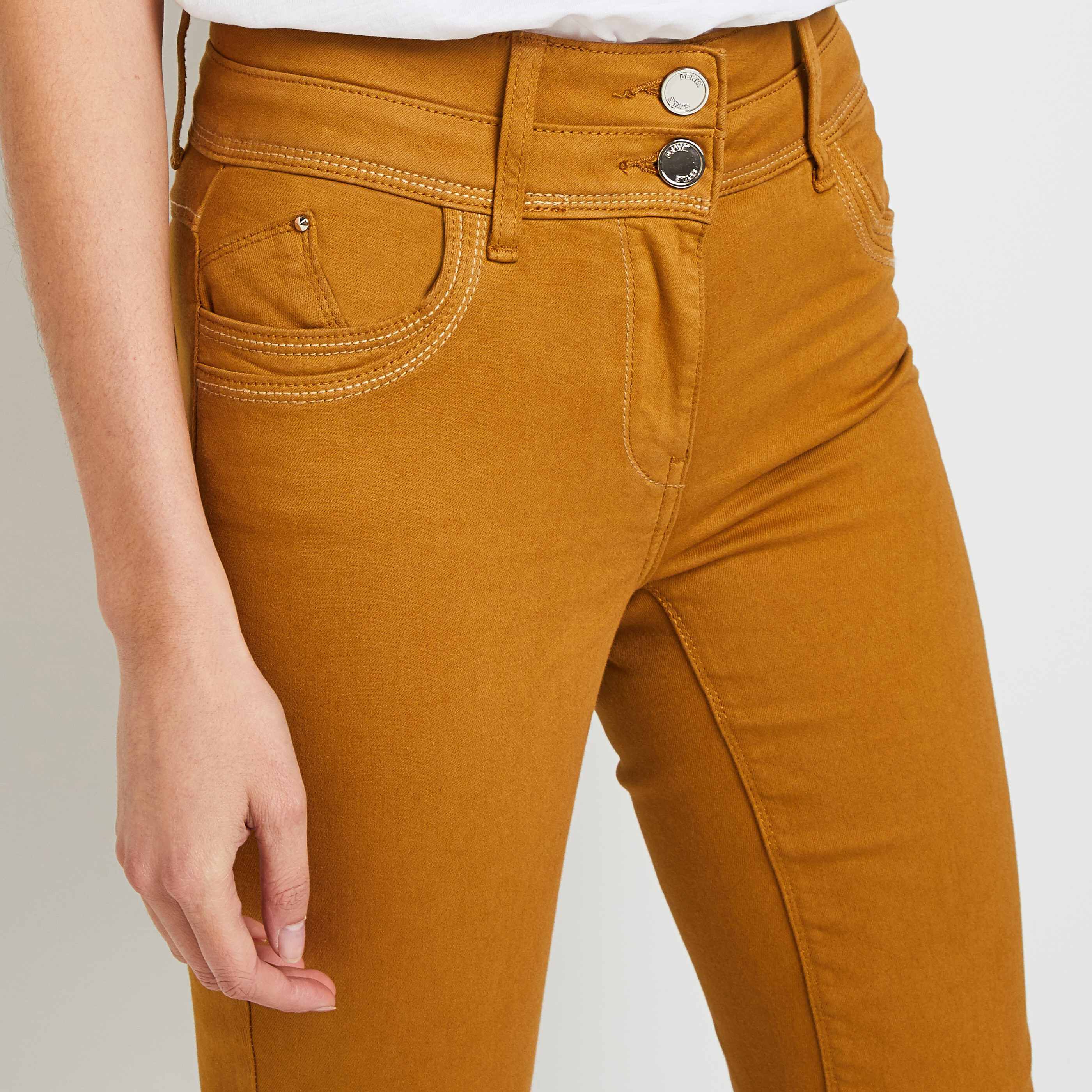 Jean slim top moutarde femme