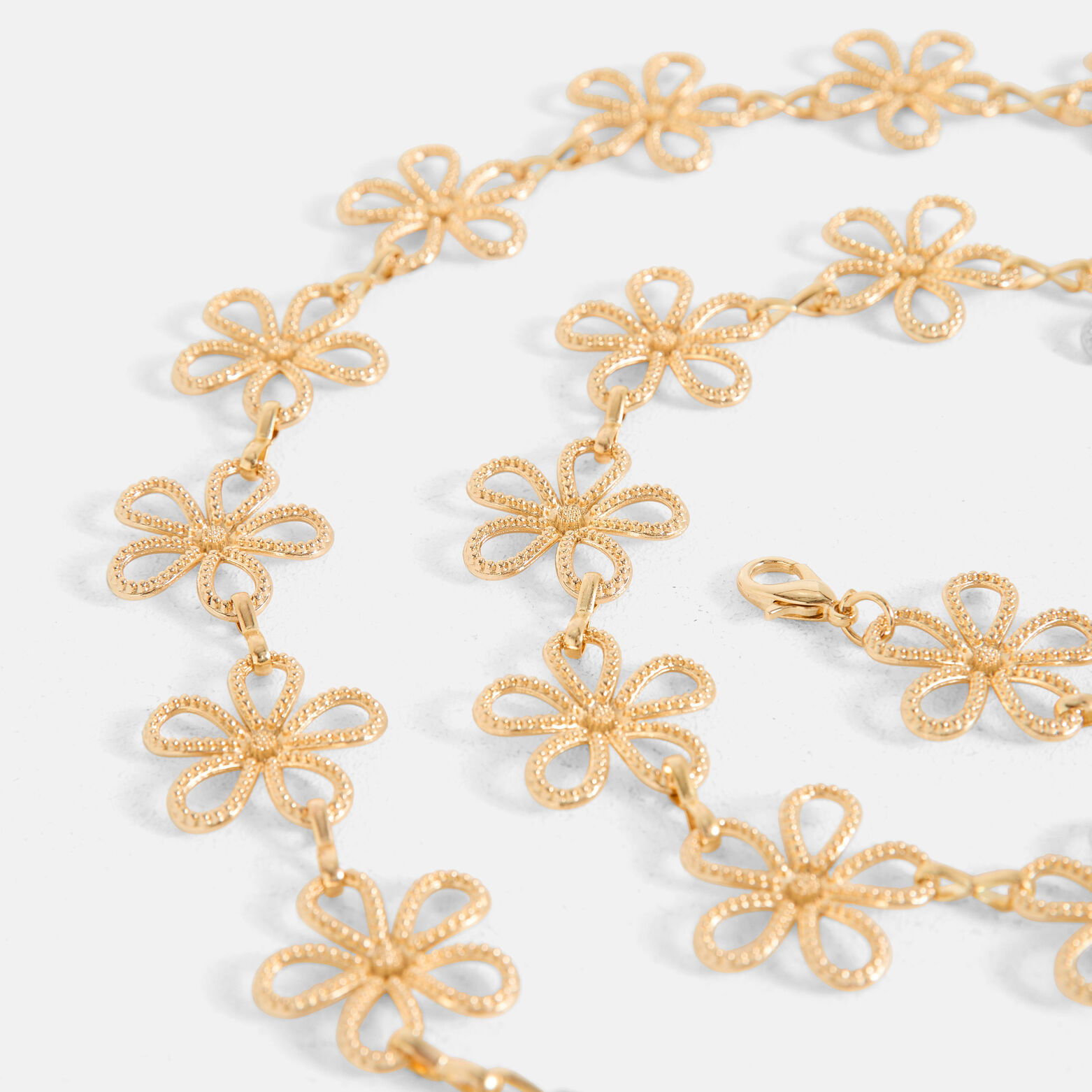Ceinture fleurs en métal femme