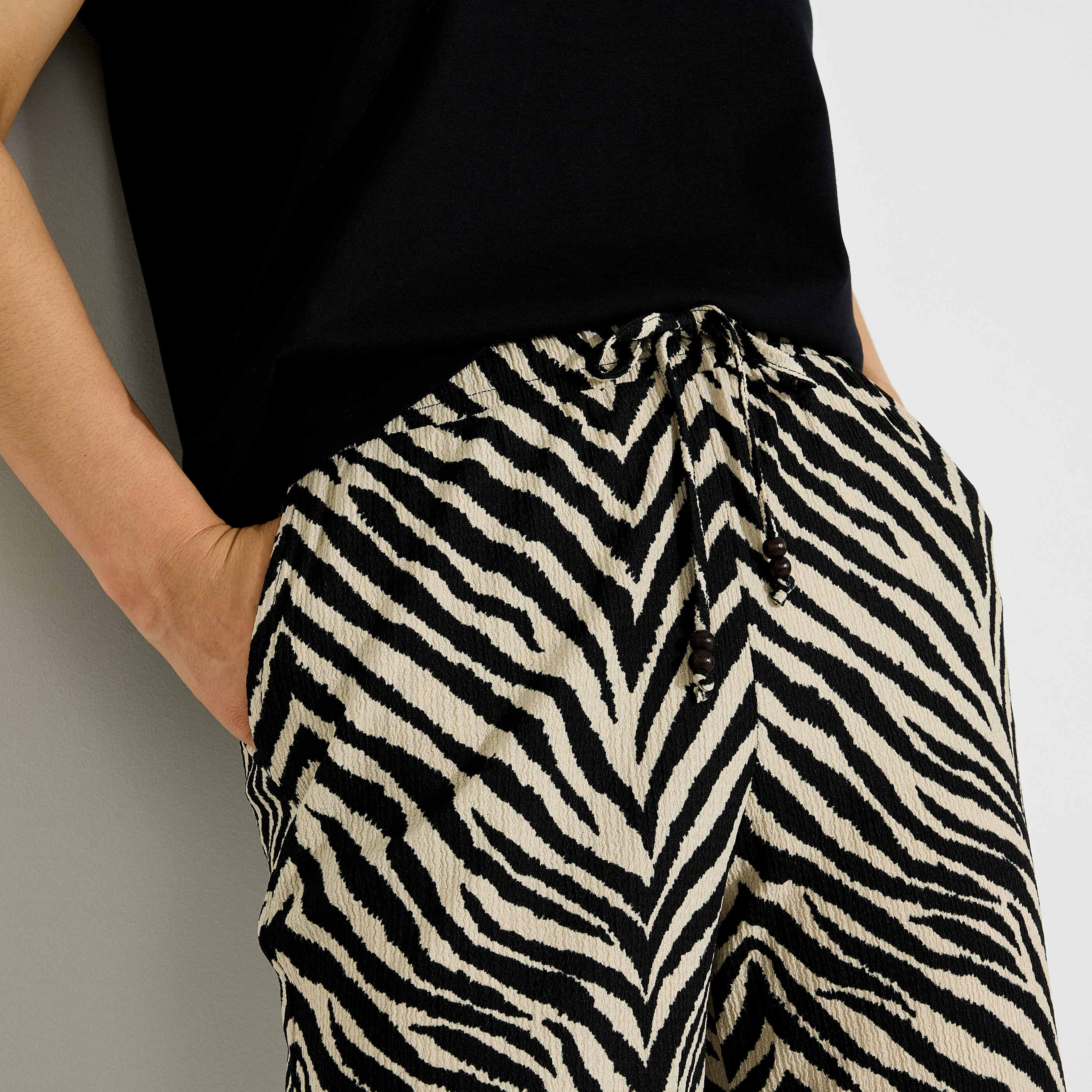 Pantalon fluide imprim&eacute; z&eacute;br&eacute; femme