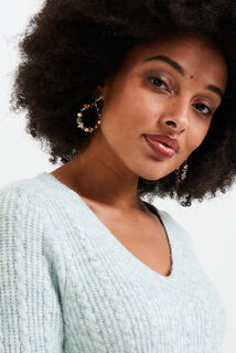Pull torsadé femme