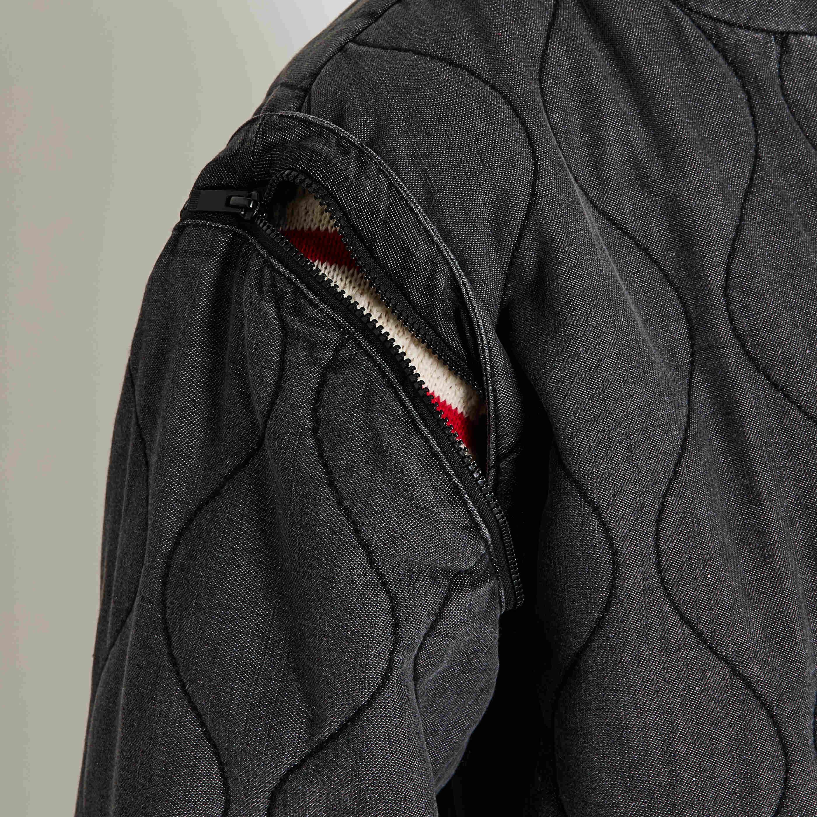 Veste matelass&eacute;e manches amovibles femme