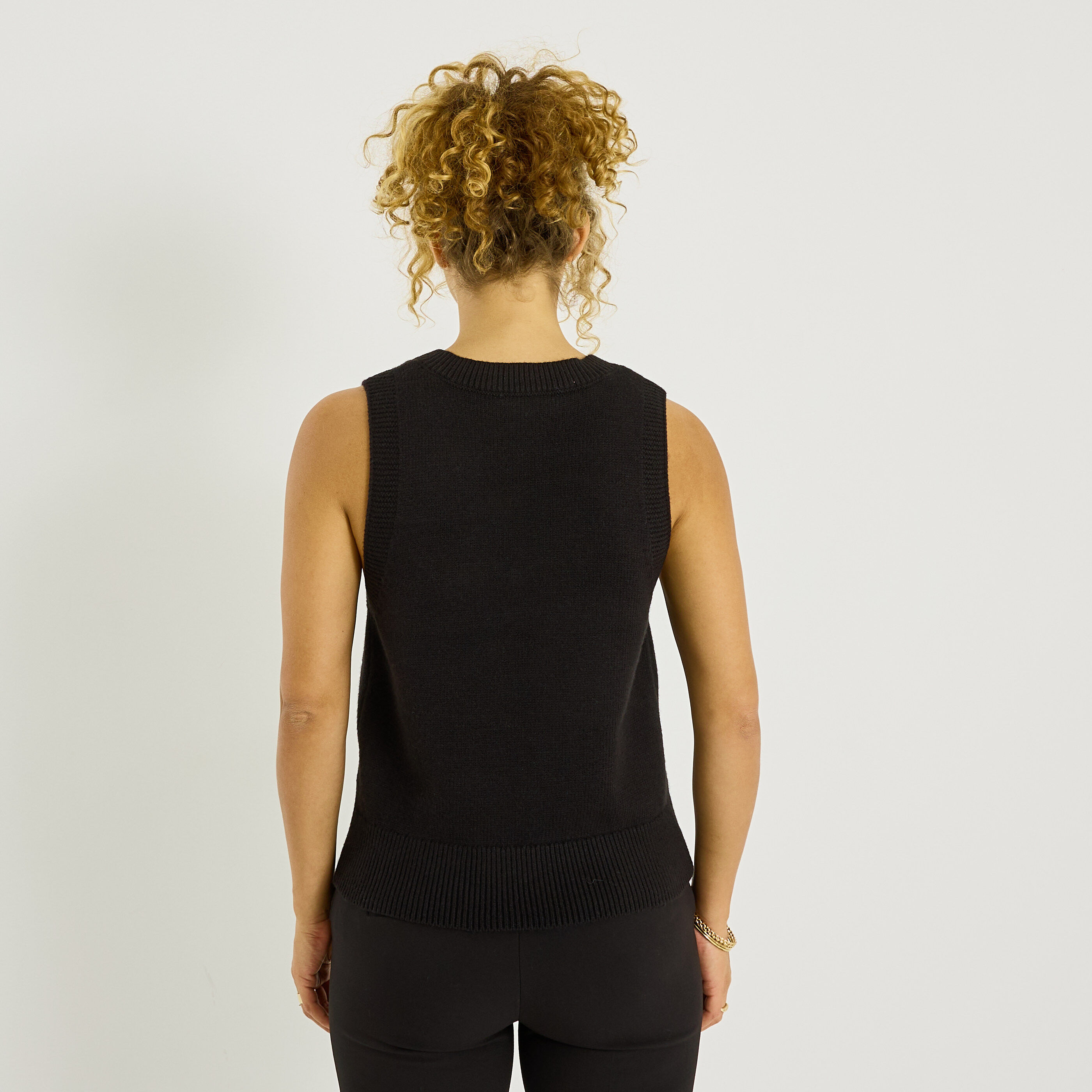 Pull col V sans manches femme