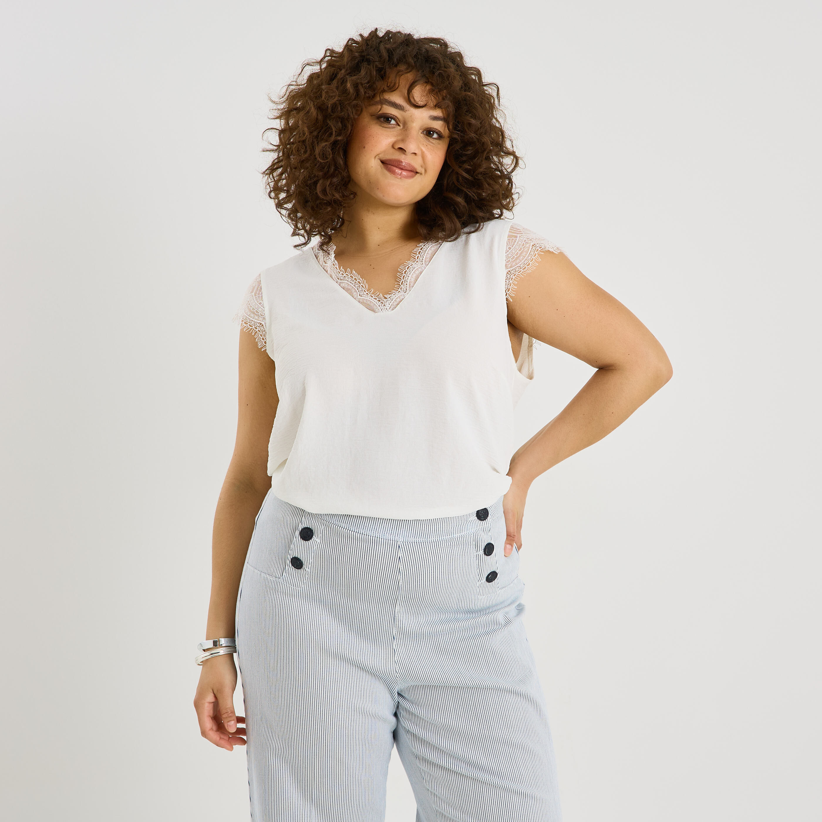 Blouse sans manches col V femme