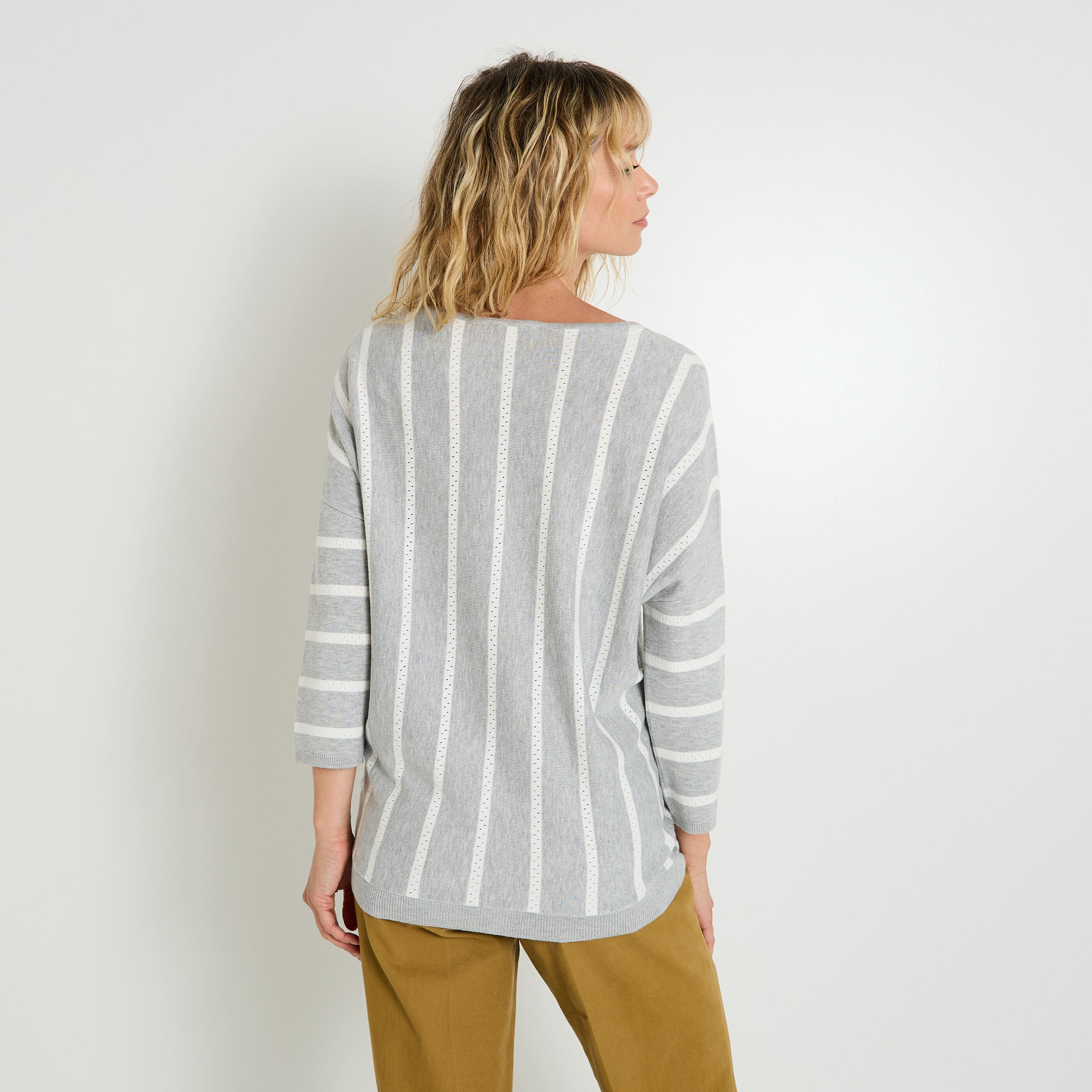 Pull ray&eacute; loose femme