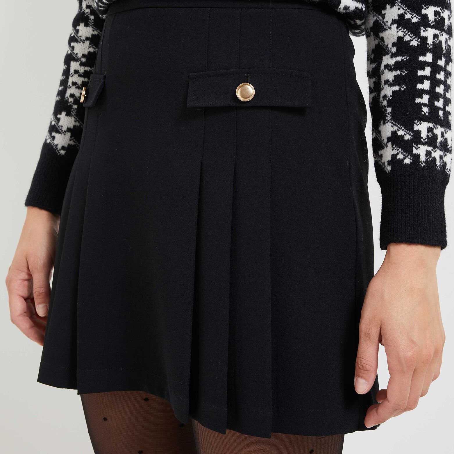 Jupe courte noire plissée femme
