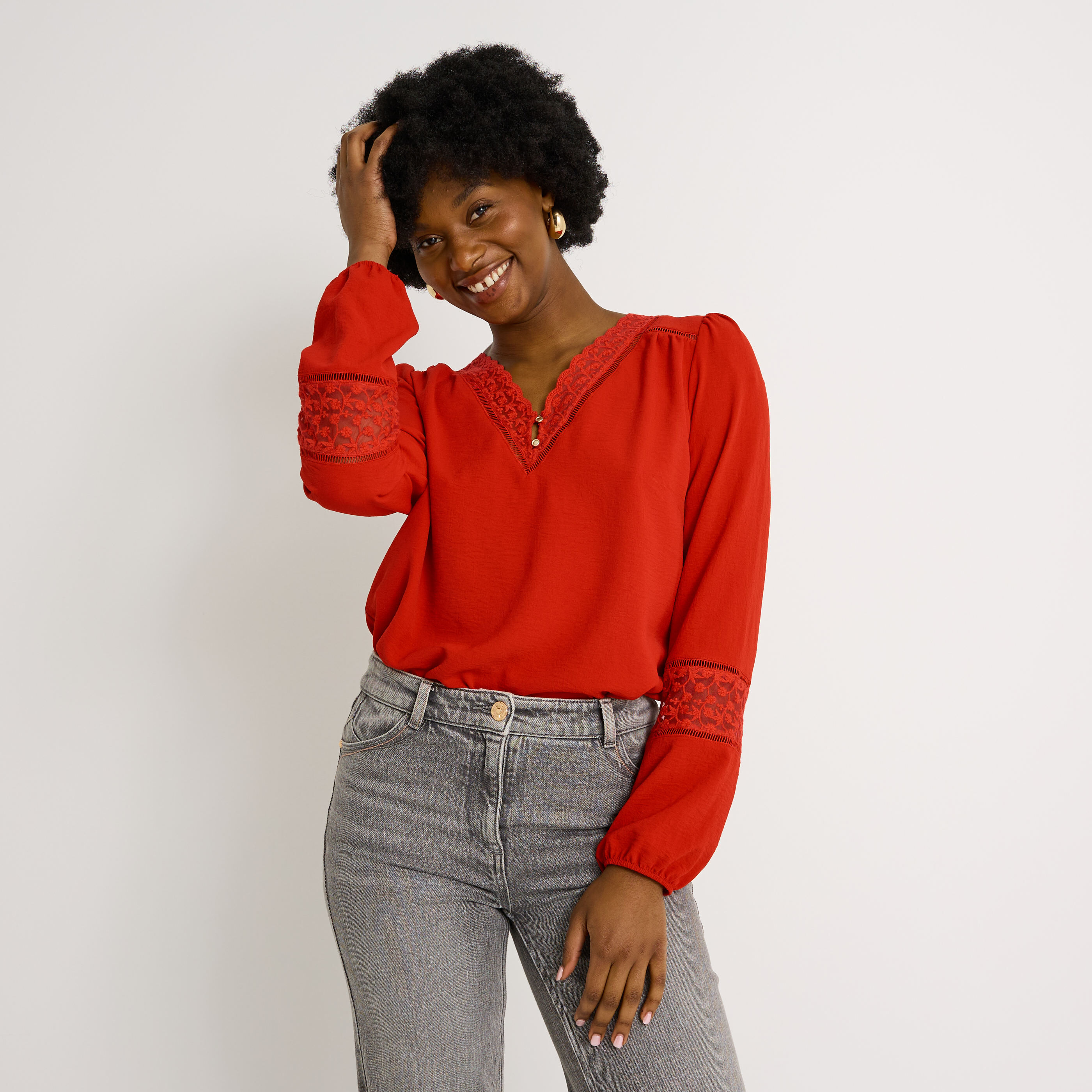 Blouse unie d&eacute;tails ajour&eacute;s femme