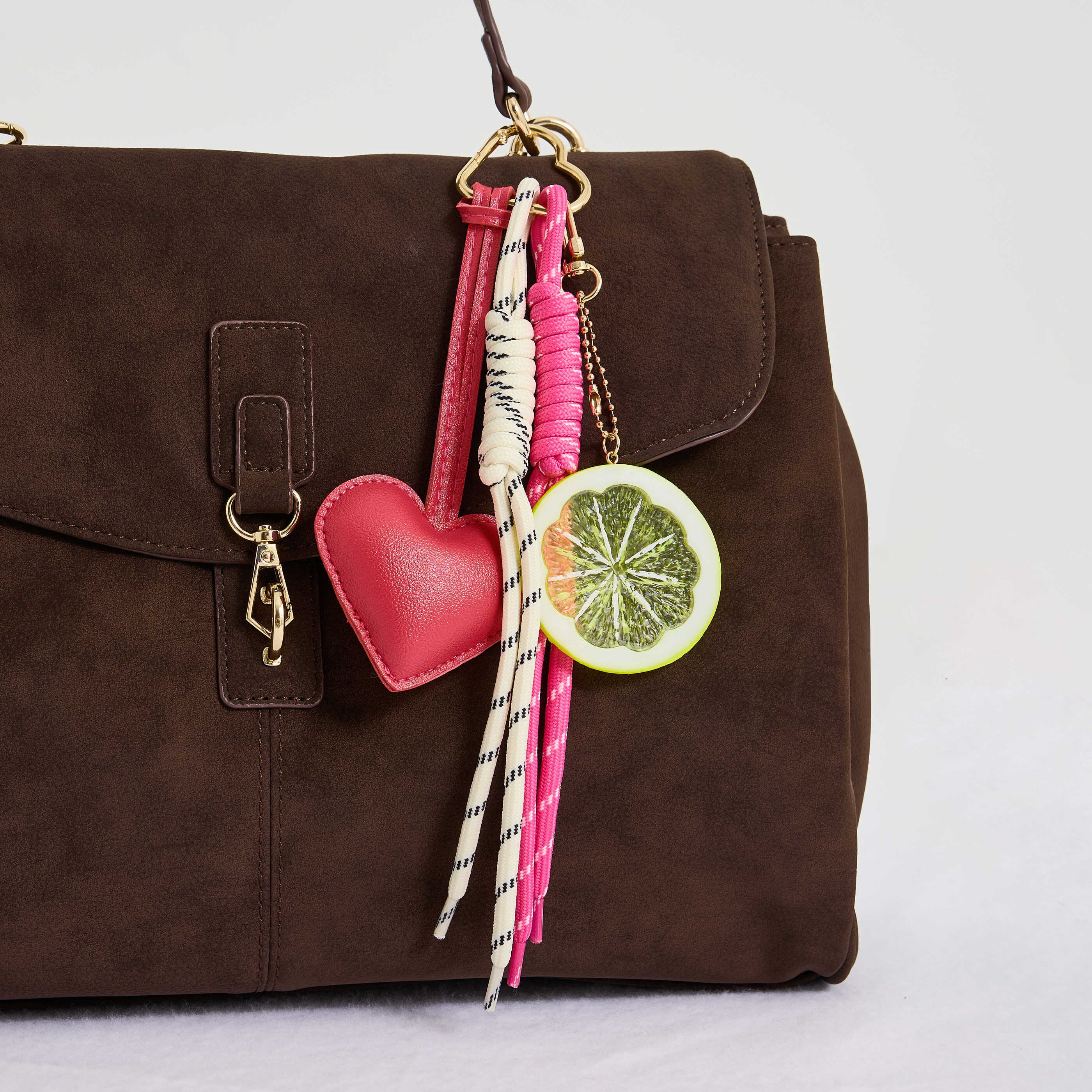 Grigri de sac forme c&oelig;ur et citron femme