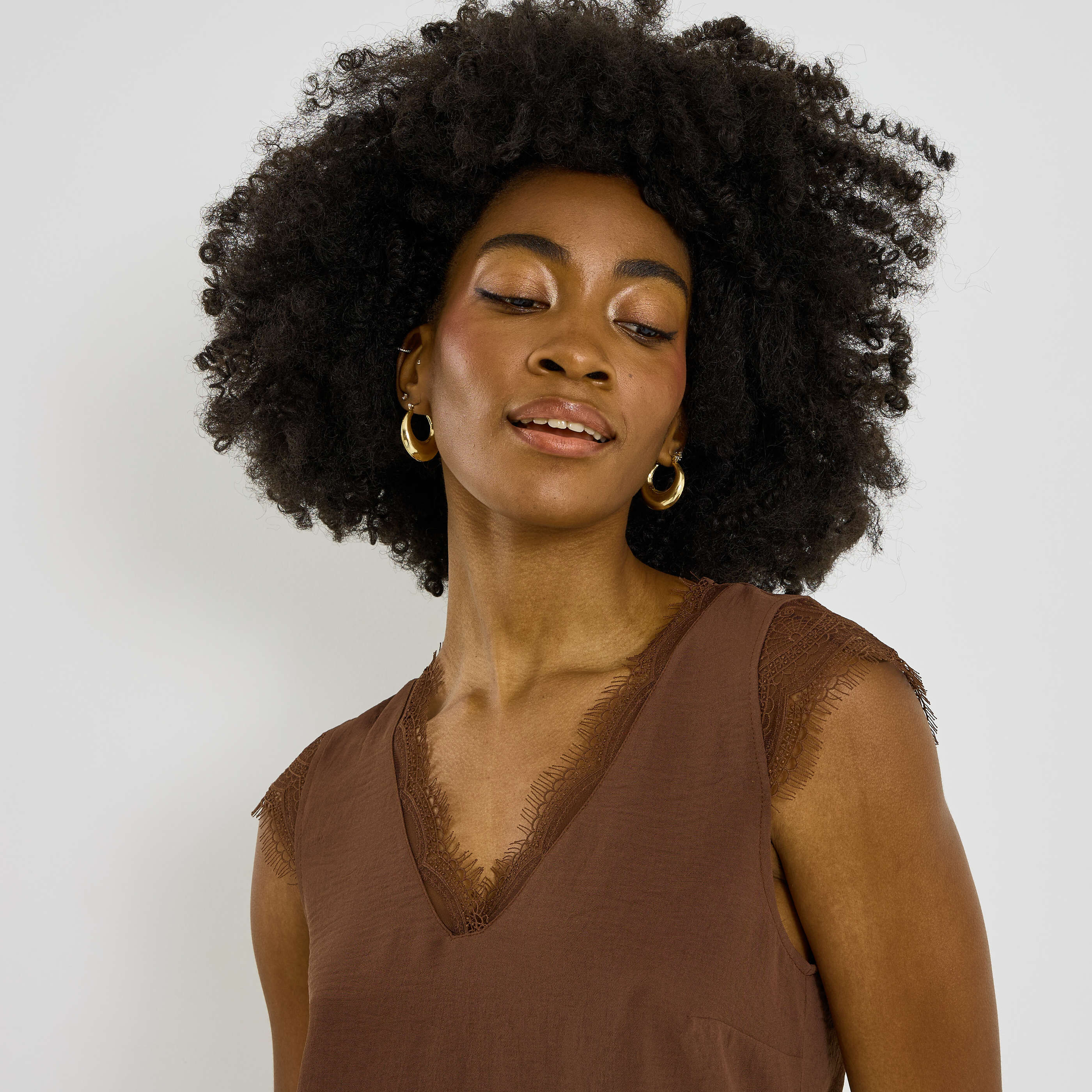 Blouse sans manches col V femme