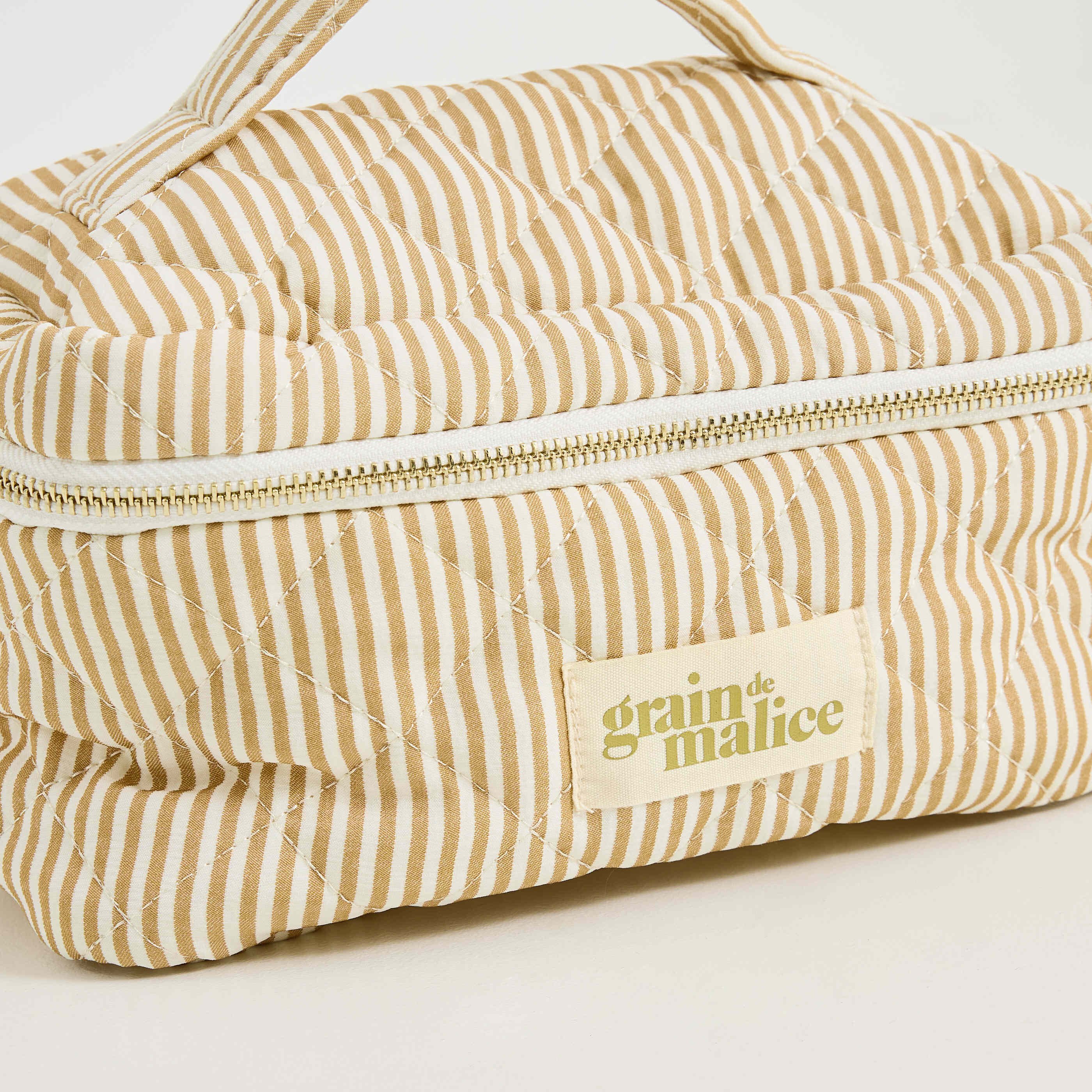 Trousse de toilette matelass&eacute;e femme