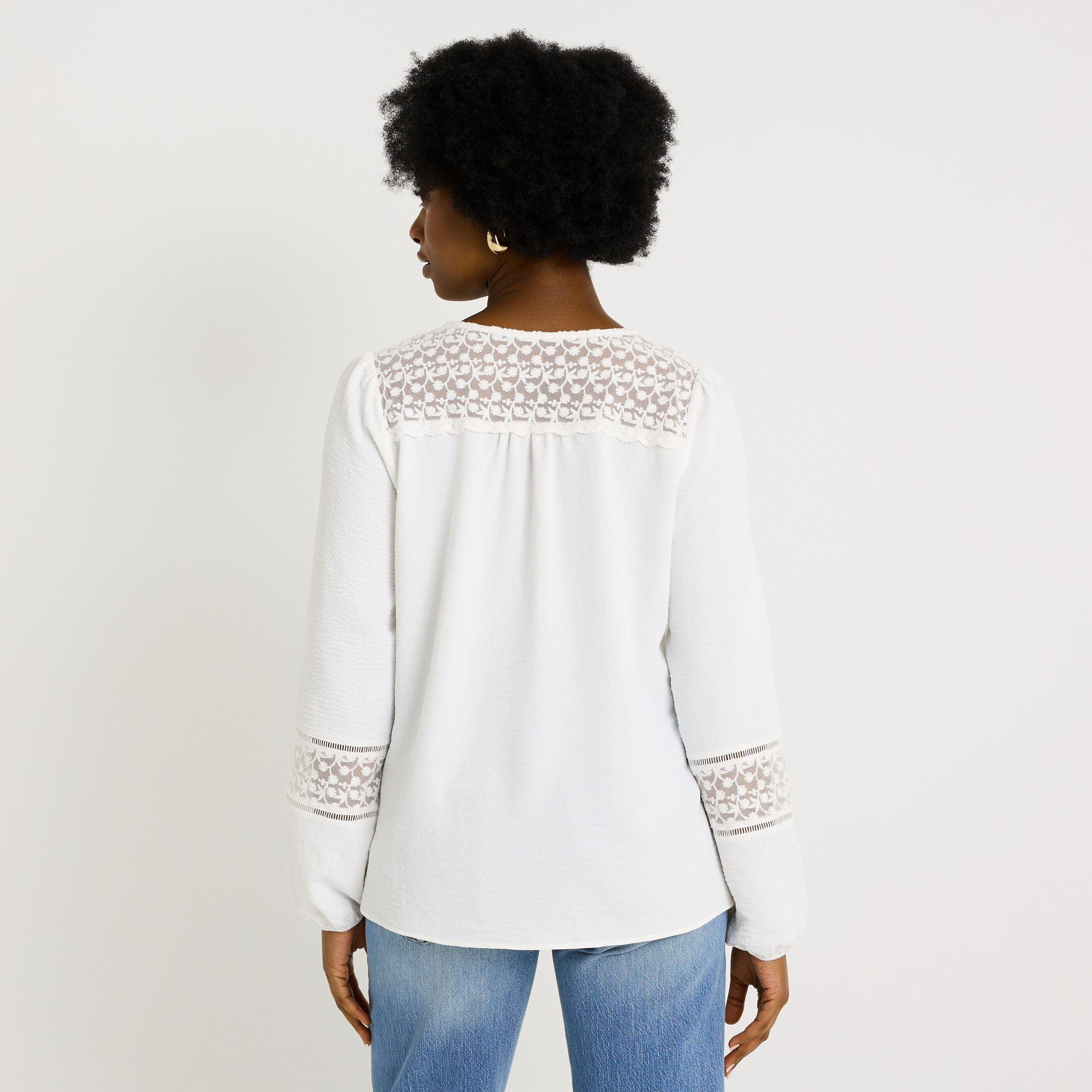 Blouse unie d&eacute;tails ajour&eacute;s femme