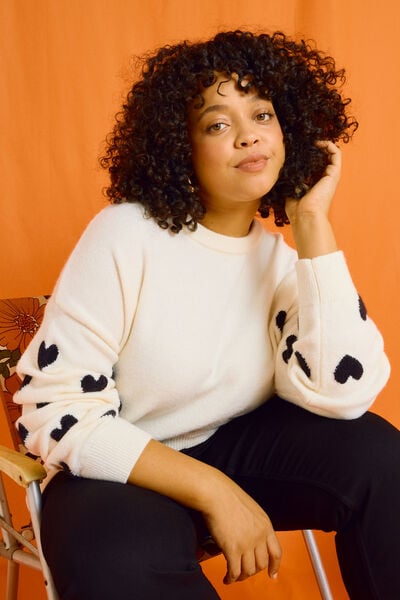 Pull col rond imprimé cœurs femme