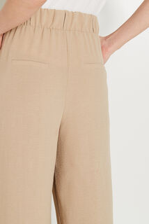 Pantalon à pince large femme