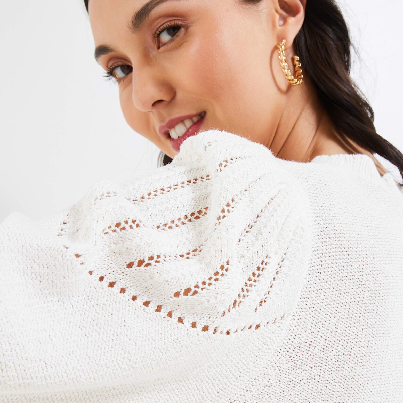 Pull en maille ajourée manches courtes