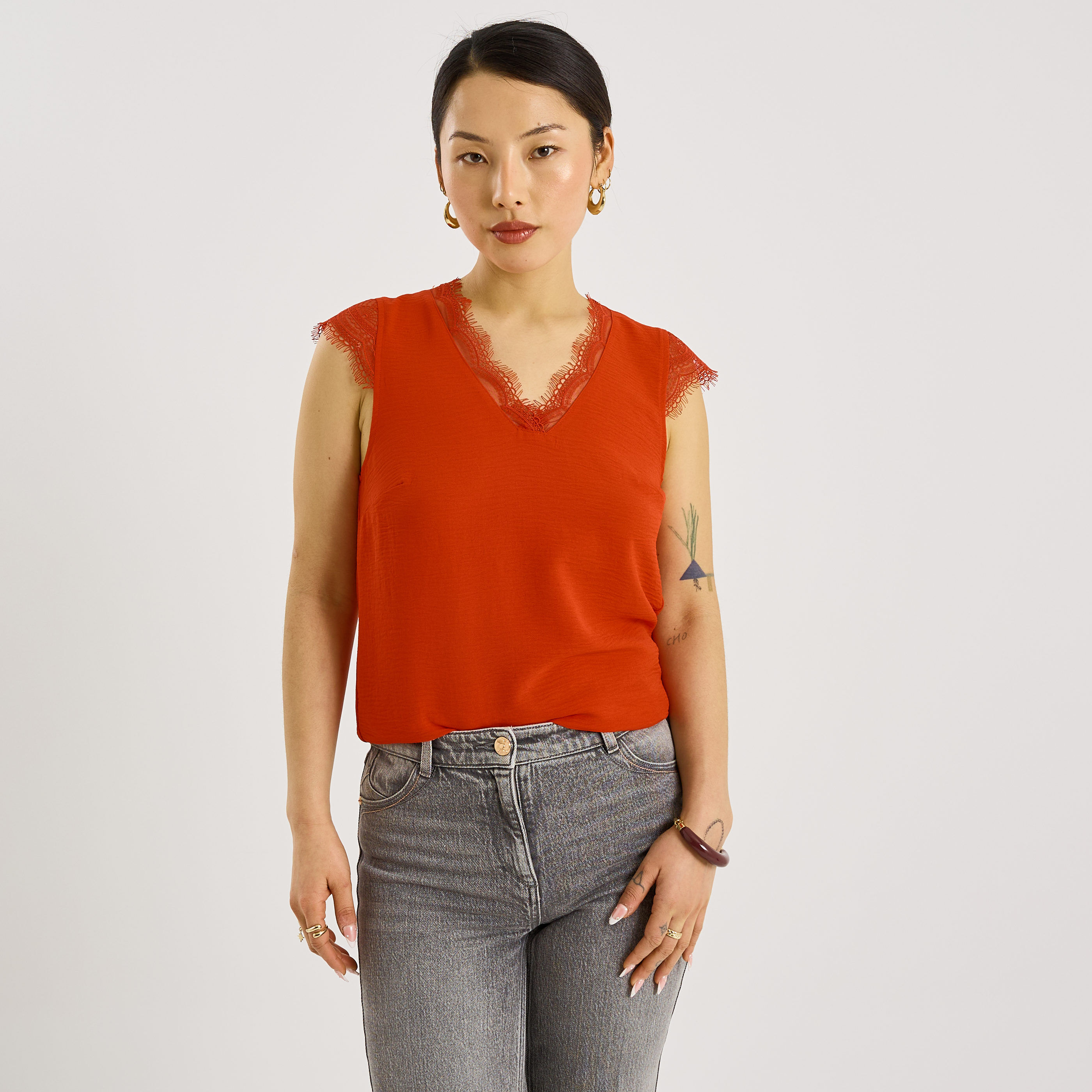 Blouse sans manches col V femme