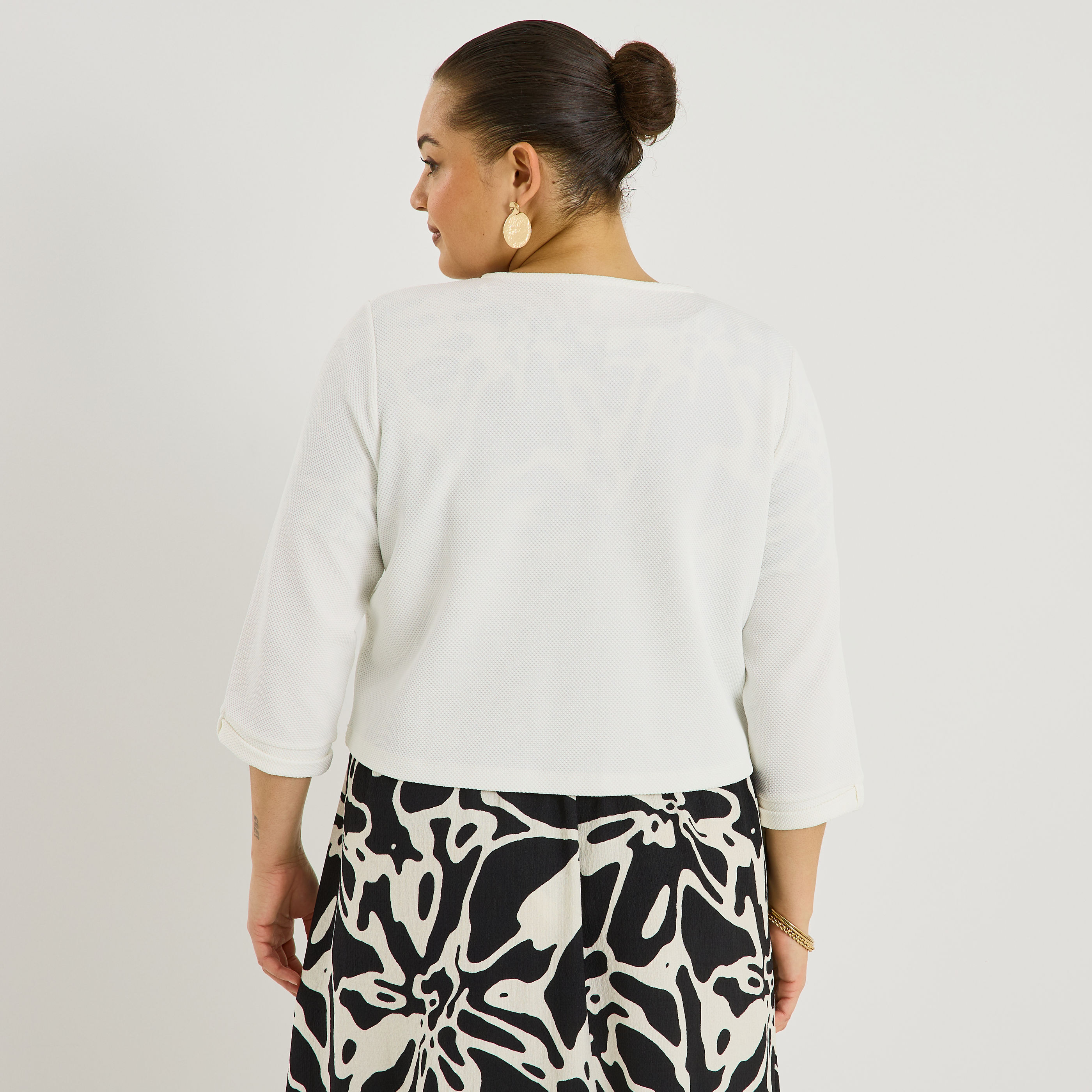 Bol&eacute;ro en maille textur&eacute;e femme