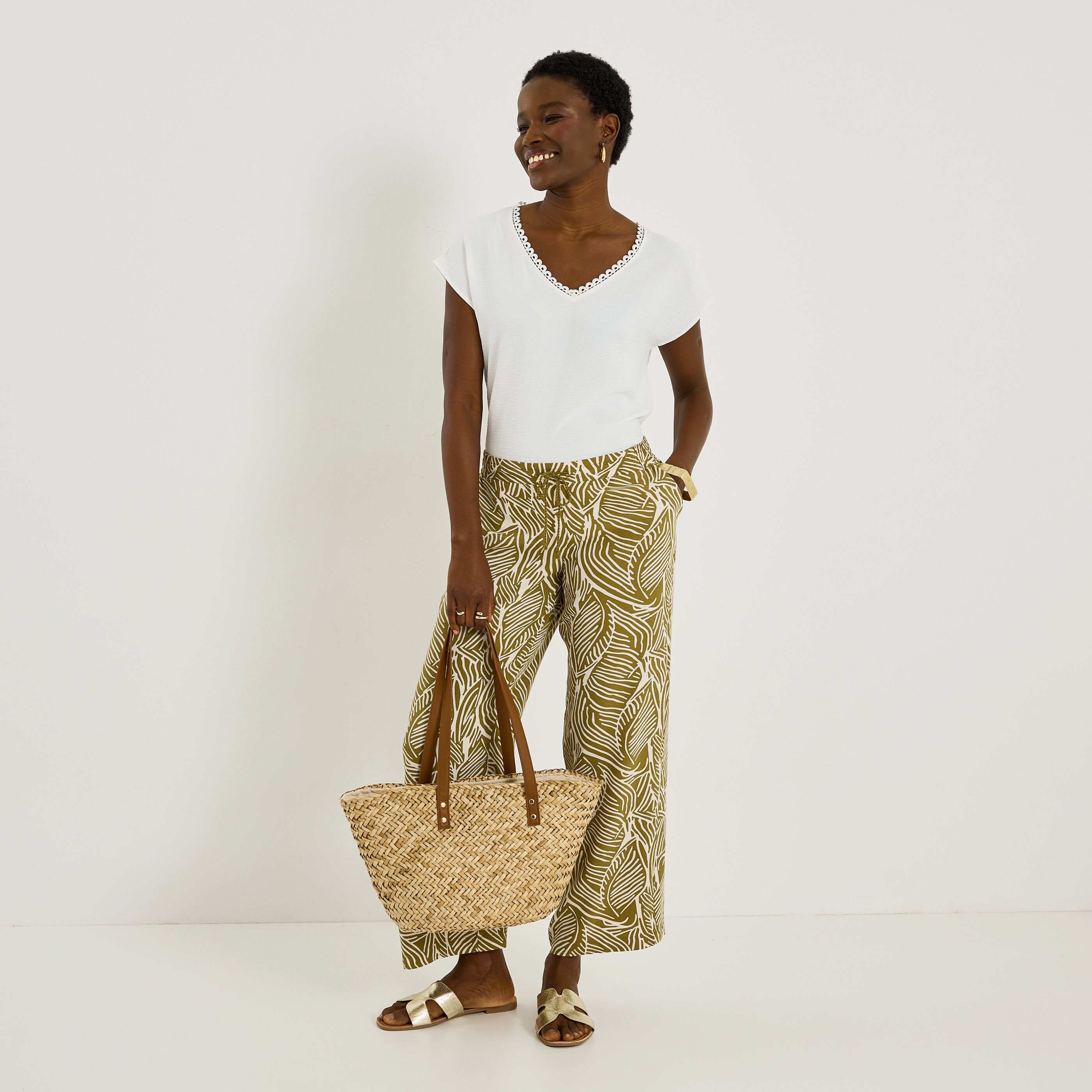 Blouse unie d&eacute;tails ajour&eacute;s femme