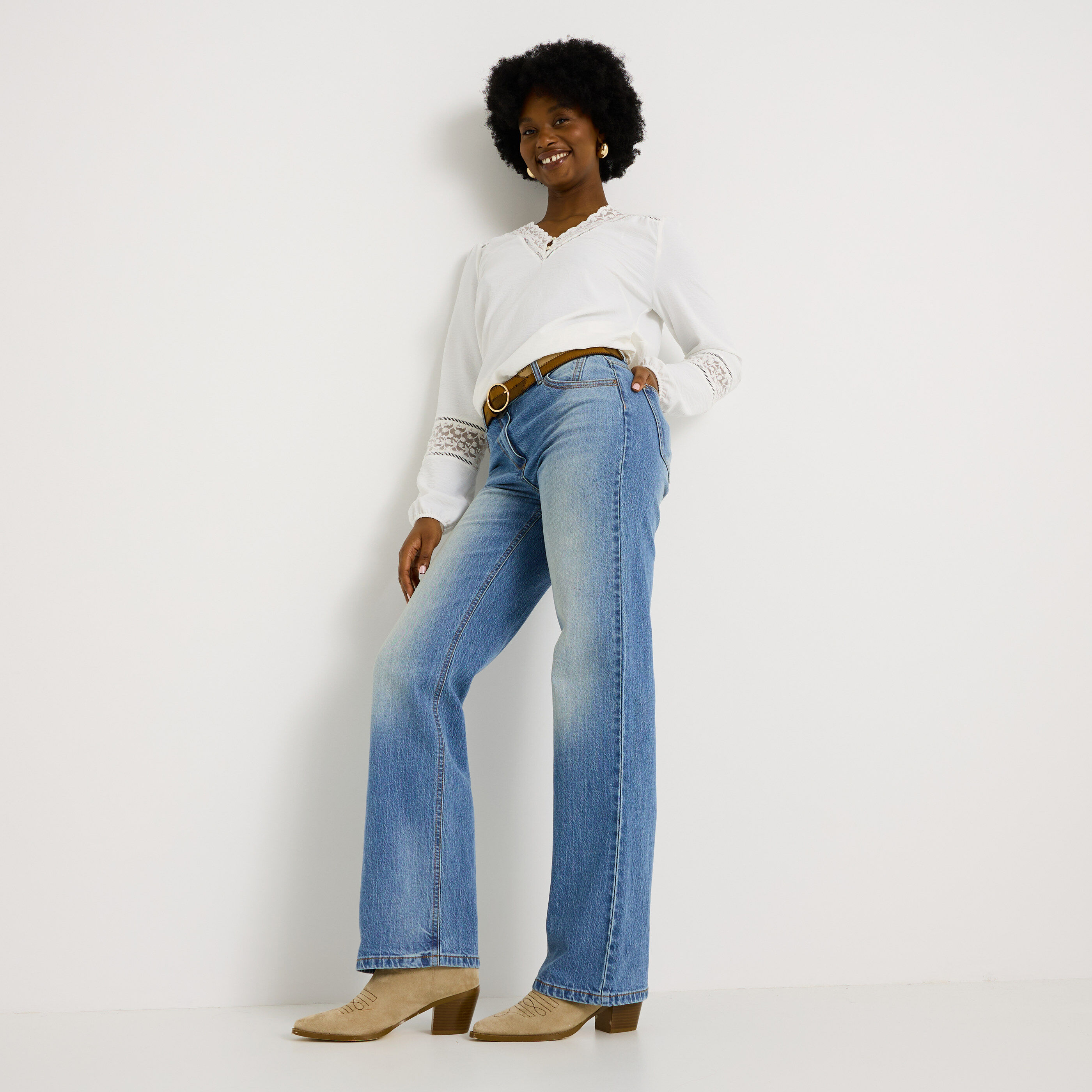 Blouse unie d&eacute;tails ajour&eacute;s femme