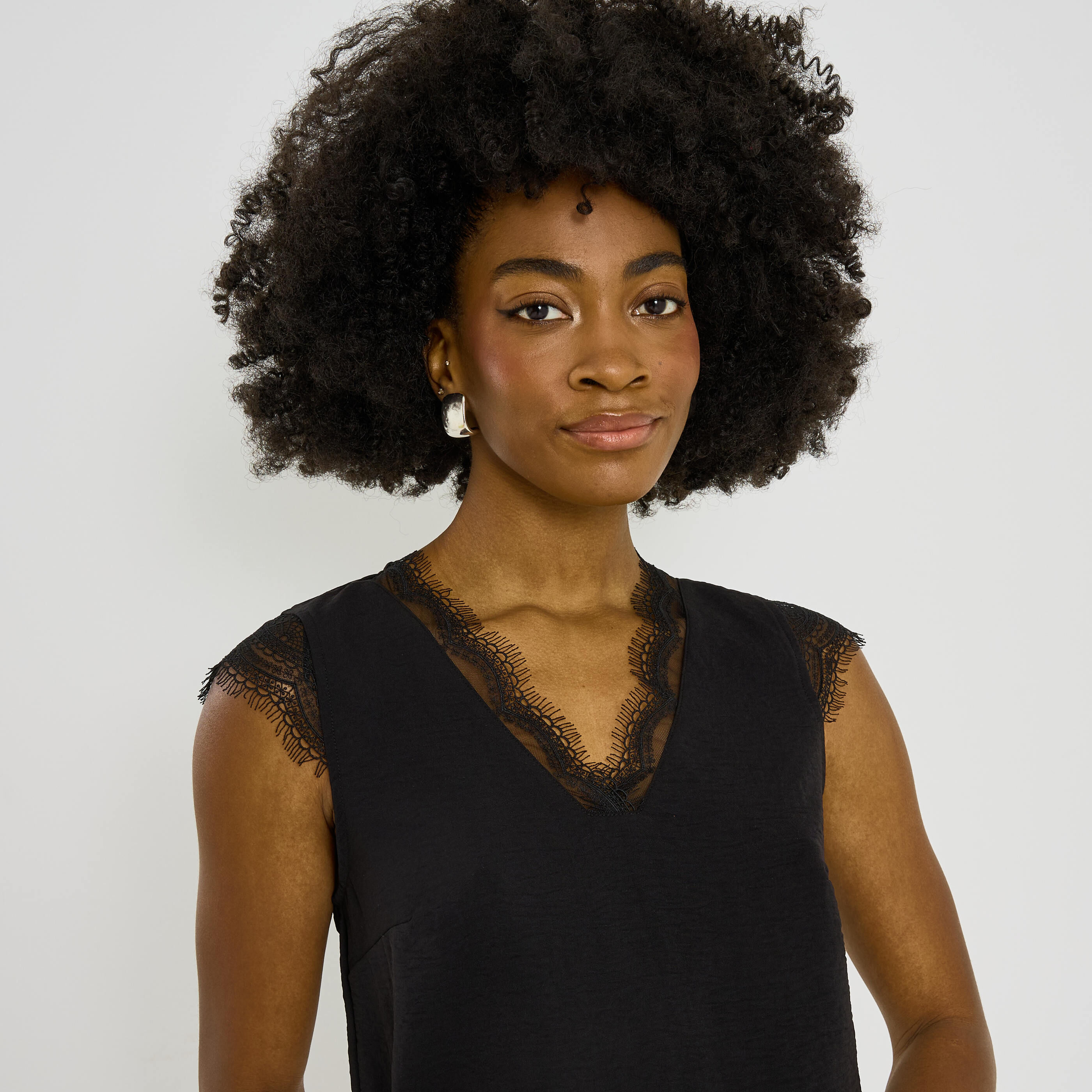 Blouse sans manches col V femme