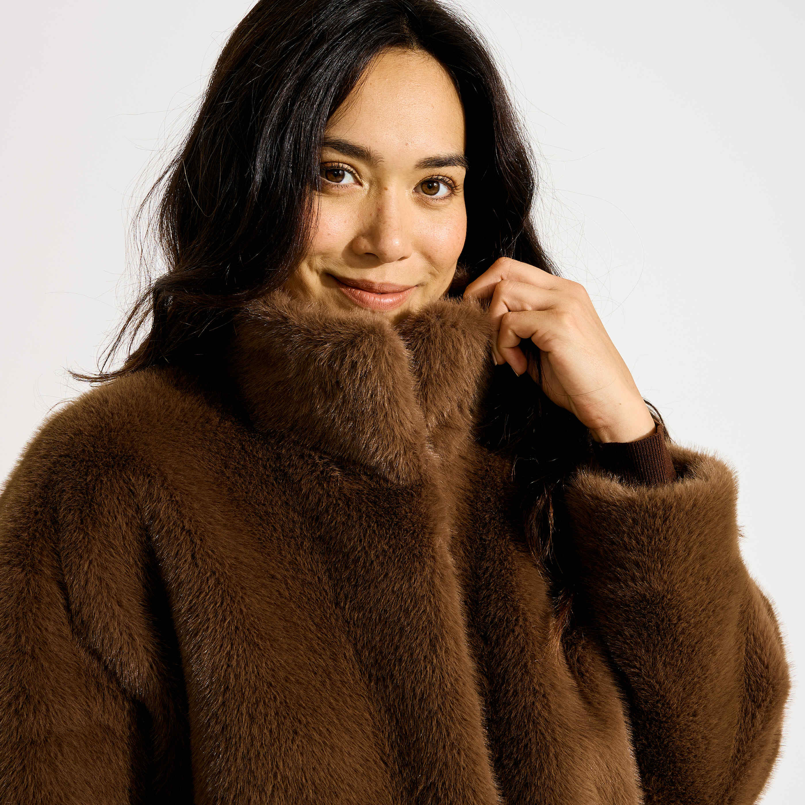 Manteau court imitation fourrure femme
