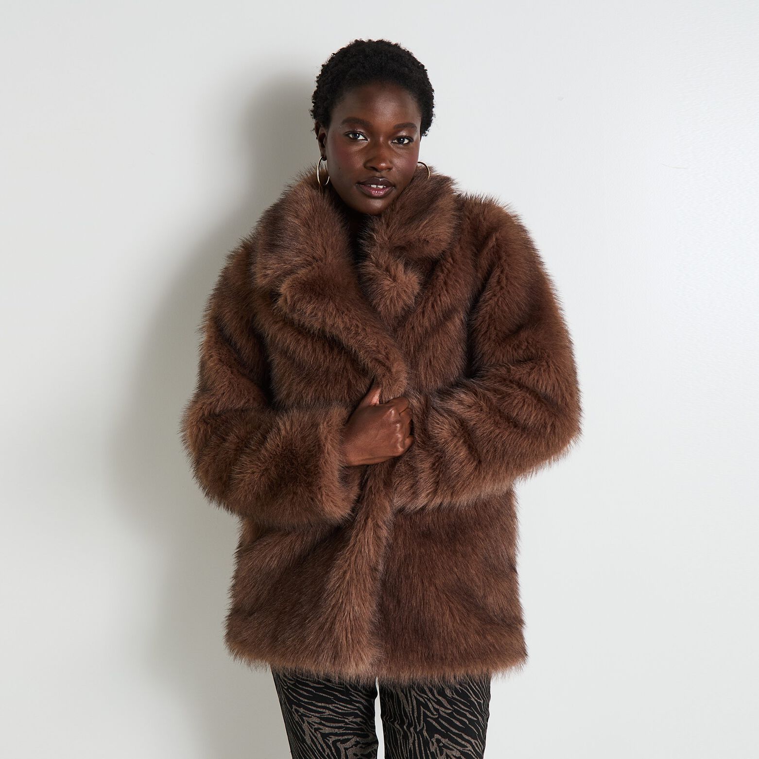 Manteau imitation fourrure femme