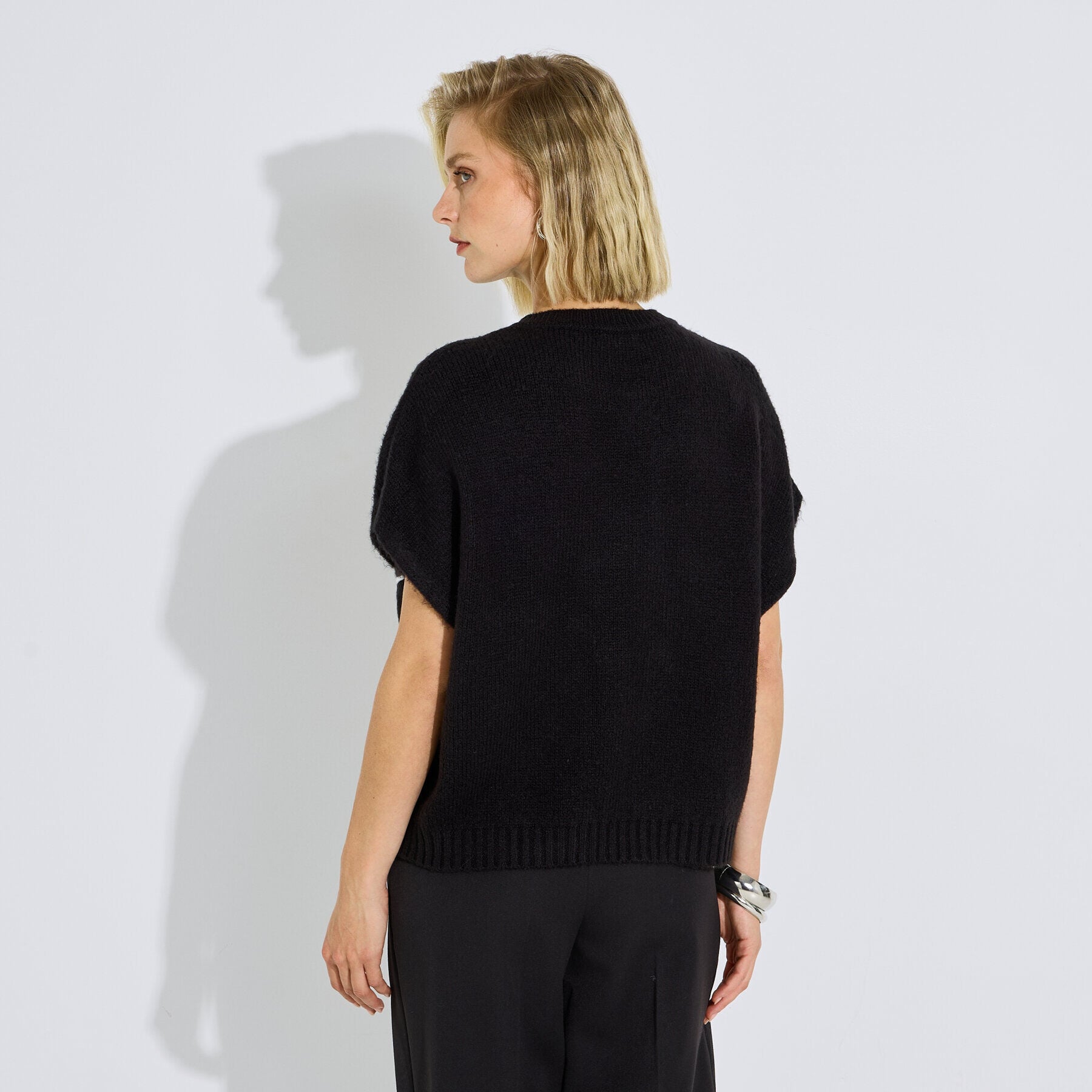 Pull sans manches motif fleur femme