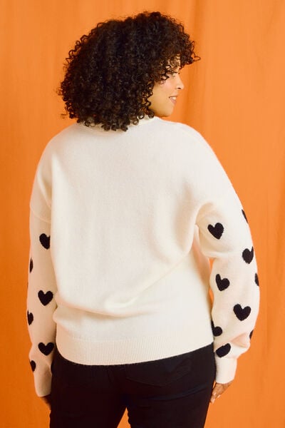 Pull col rond imprimé cœurs femme