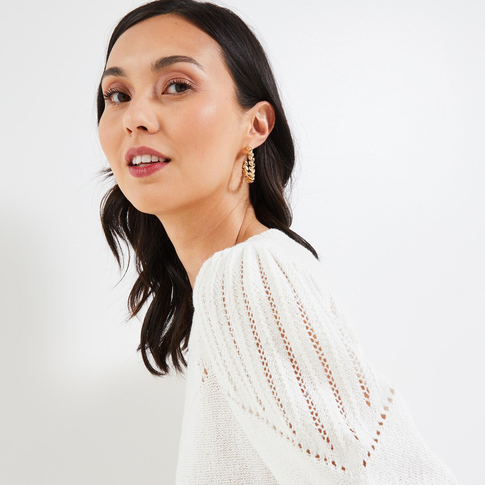 Pull en maille ajourée manches courtes