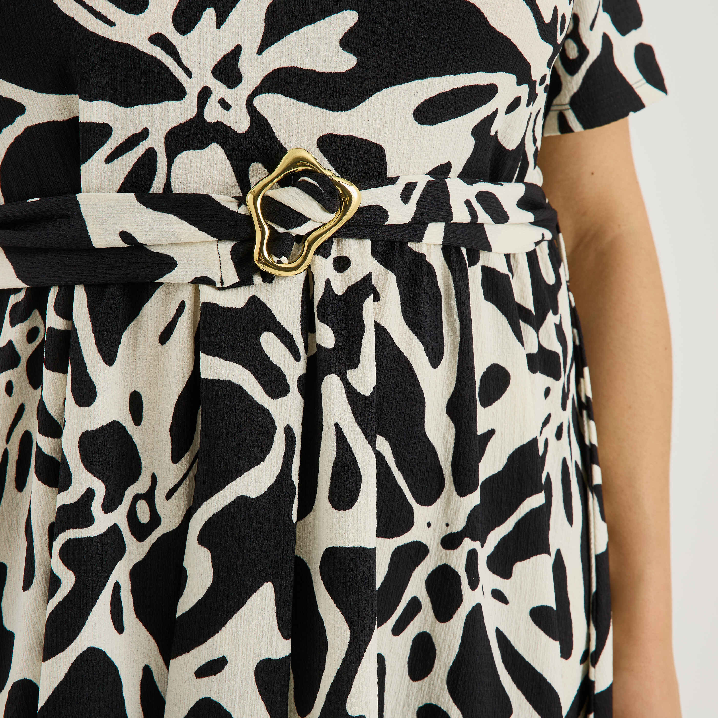 Robe longue &eacute;vas&eacute;e en maille imprim&eacute;e