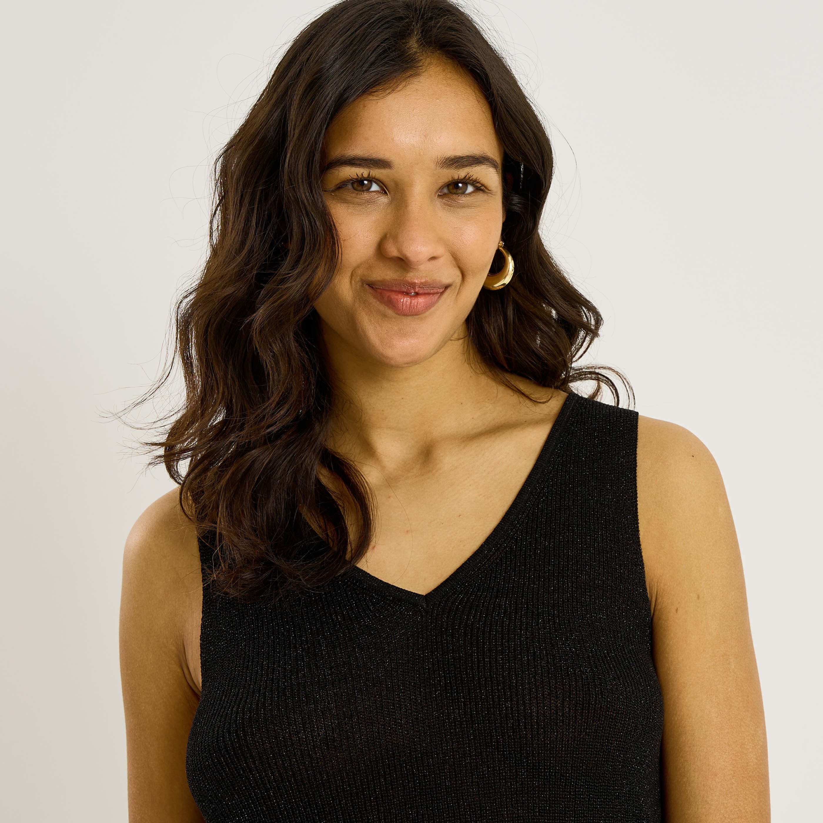 D&eacute;bardeur en maille brillante femme