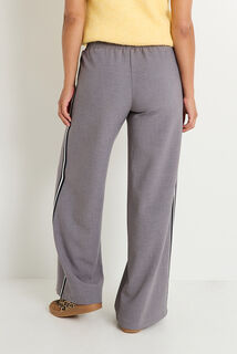 Pantalon avec bandes sur le côté femme