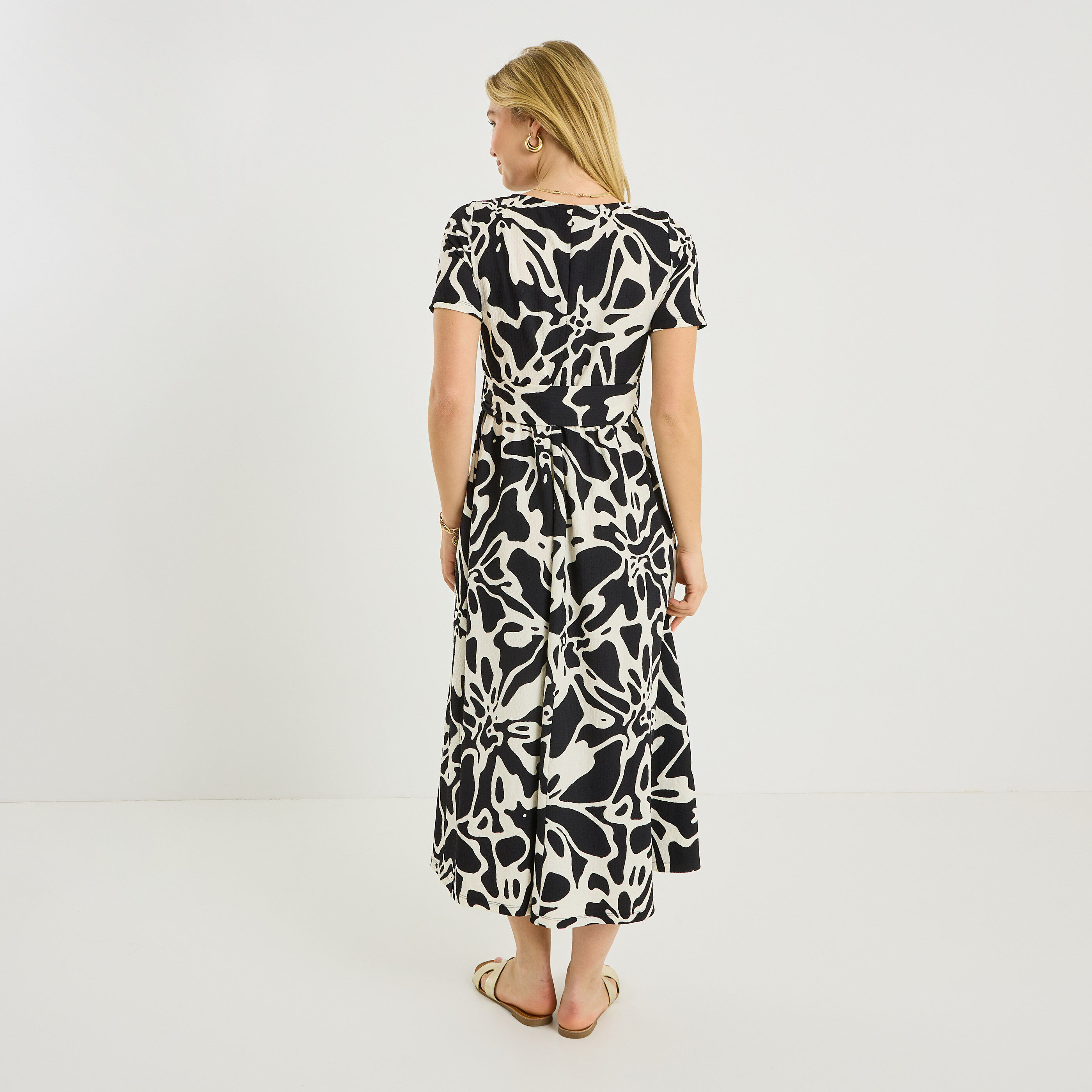 Robe longue &eacute;vas&eacute;e en maille imprim&eacute;e