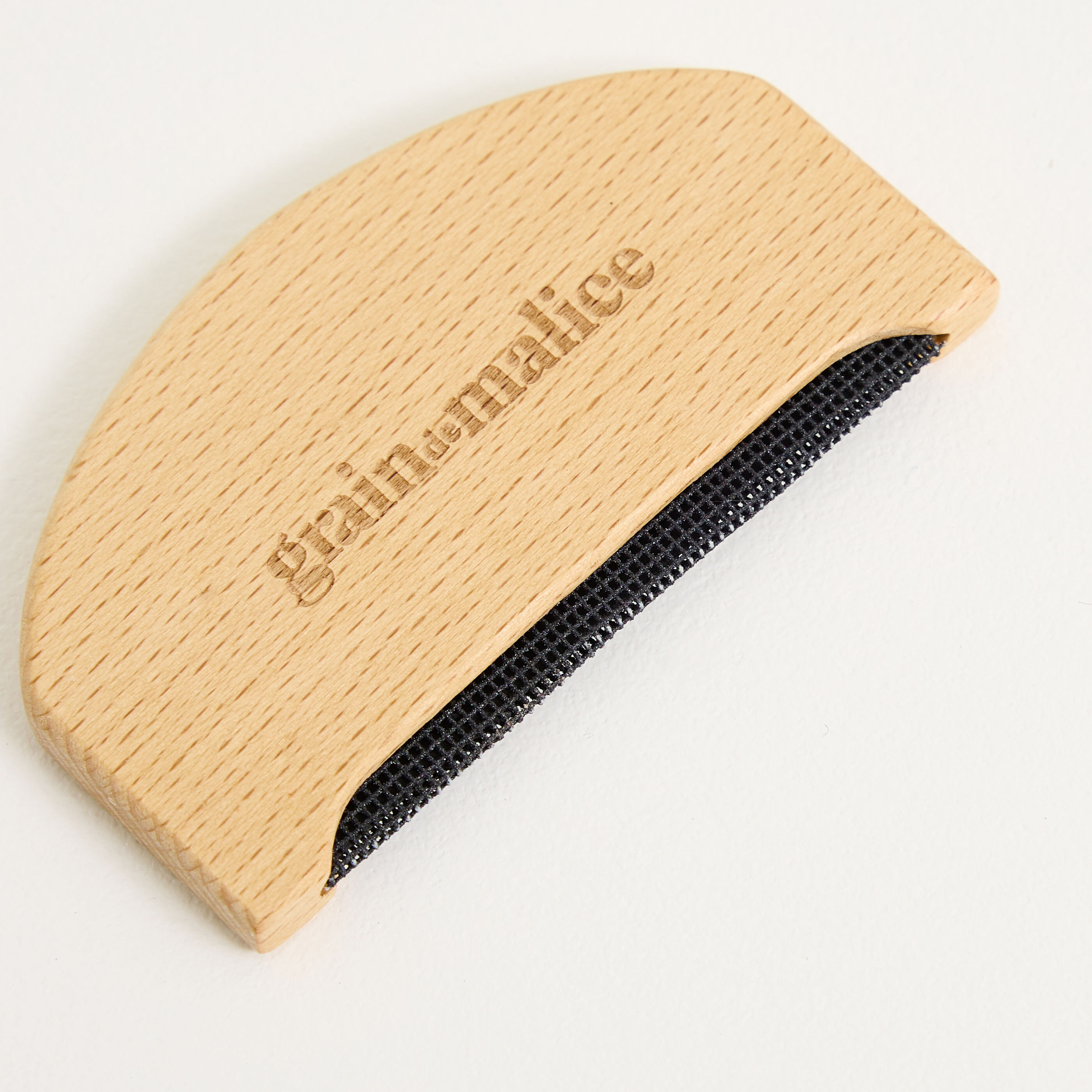 Peigne anti-bouloche femme