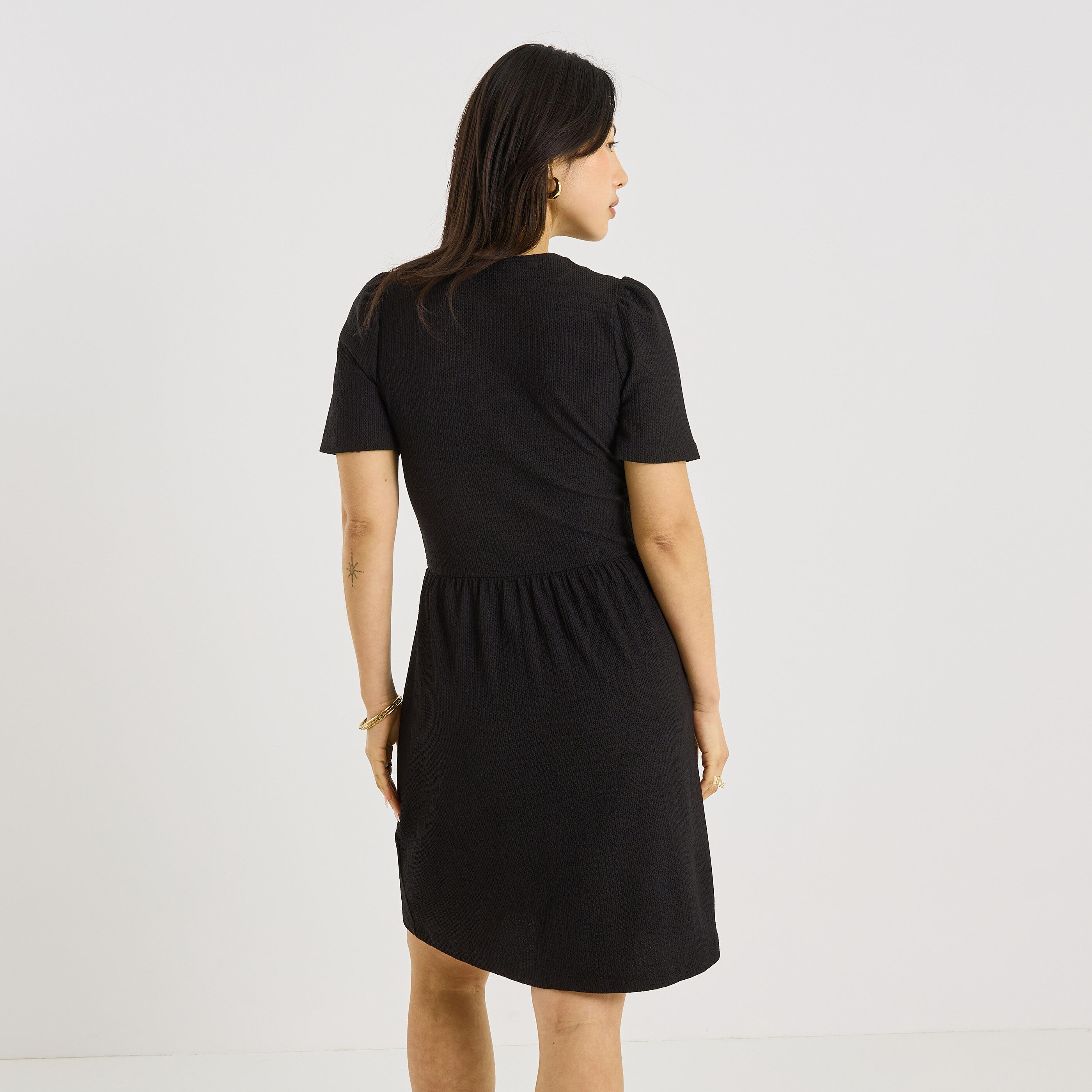 Robe en maille unie taille &eacute;lastiqu&eacute;e