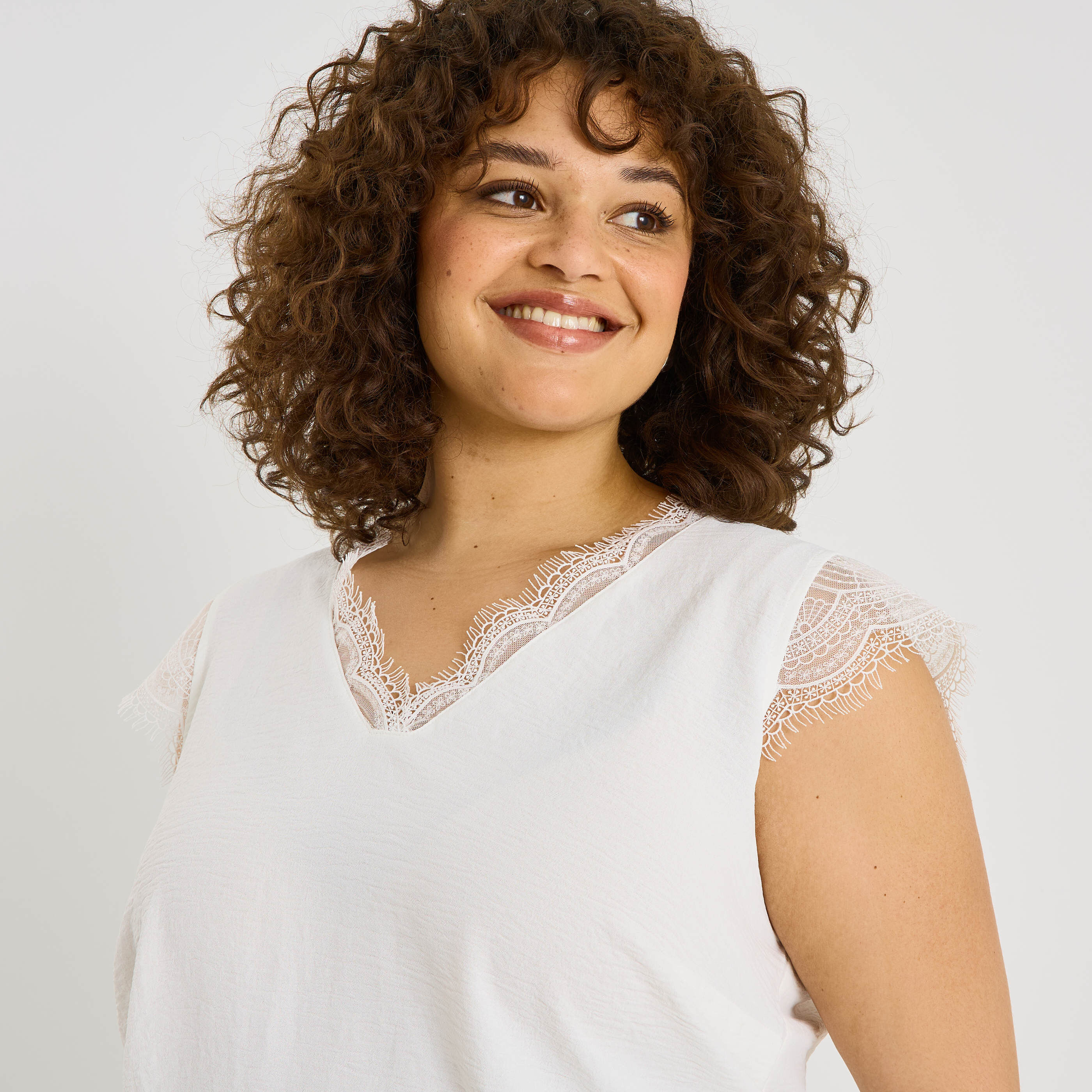 Blouse sans manches col V femme