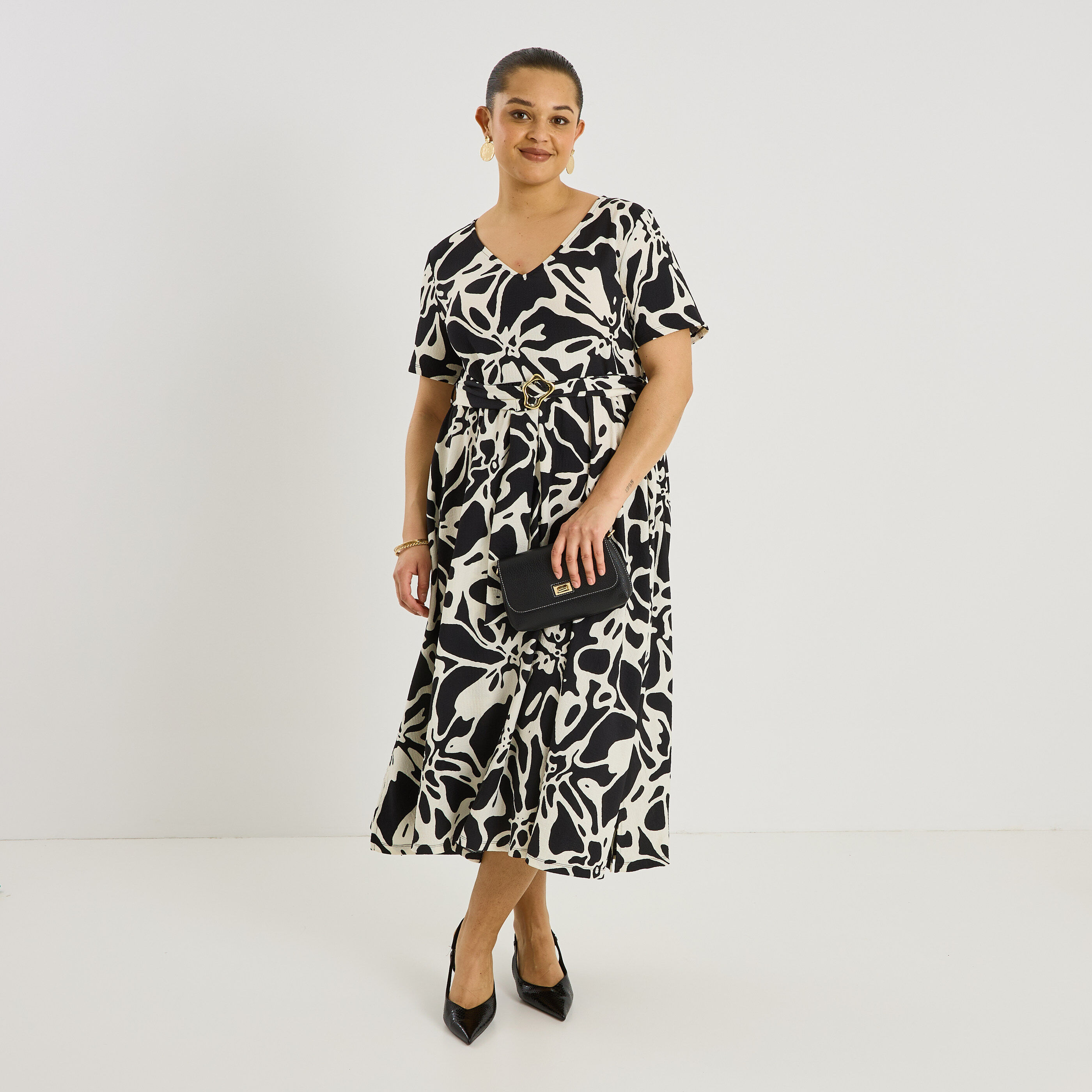 Robe longue &eacute;vas&eacute;e en maille imprim&eacute;e