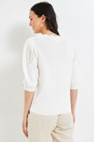 Pull en maille ajourée manches courtes