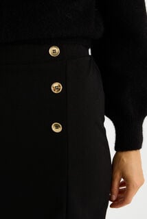 Jupe courte en maille taille élastiquée