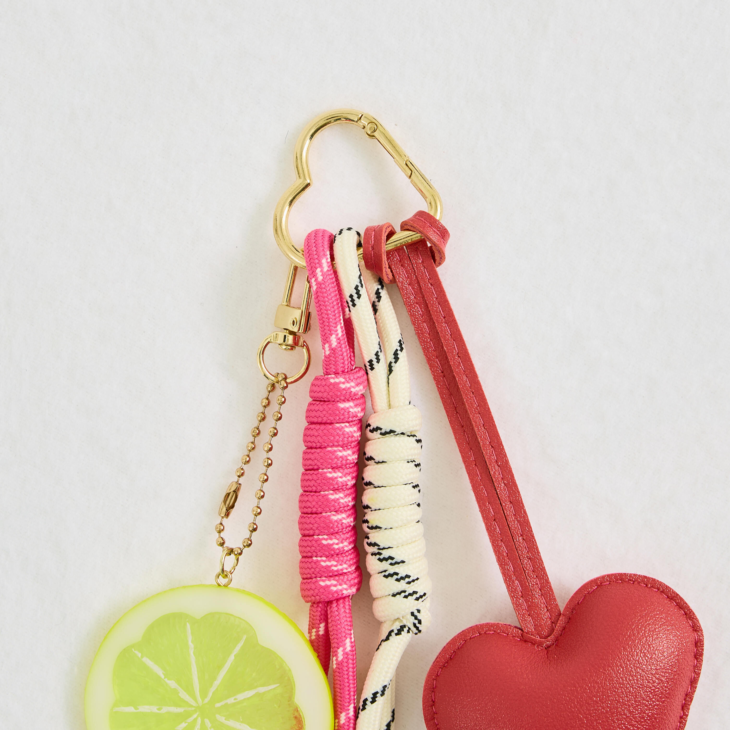 Grigri de sac forme c&oelig;ur et citron femme