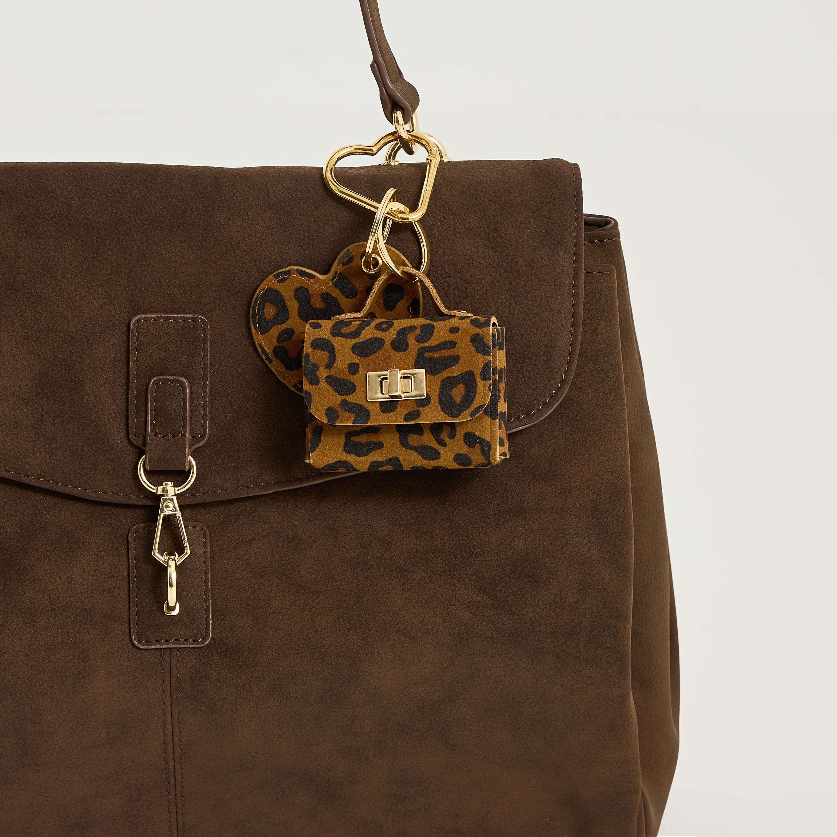 Etui &eacute;couteurs imprim&eacute; l&eacute;opard femme