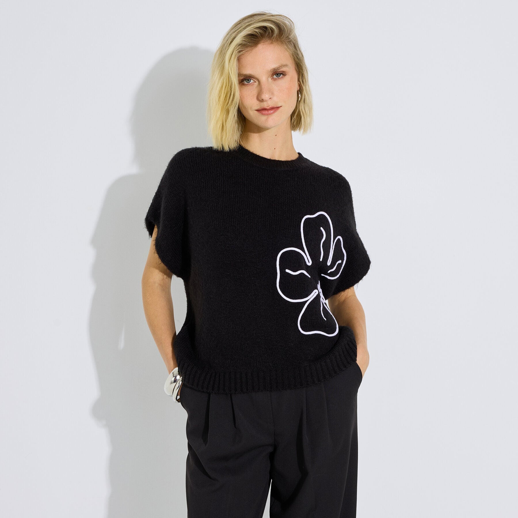 Pull sans manches motif fleur femme