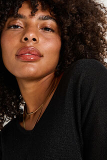 Pull brillant à col V femme