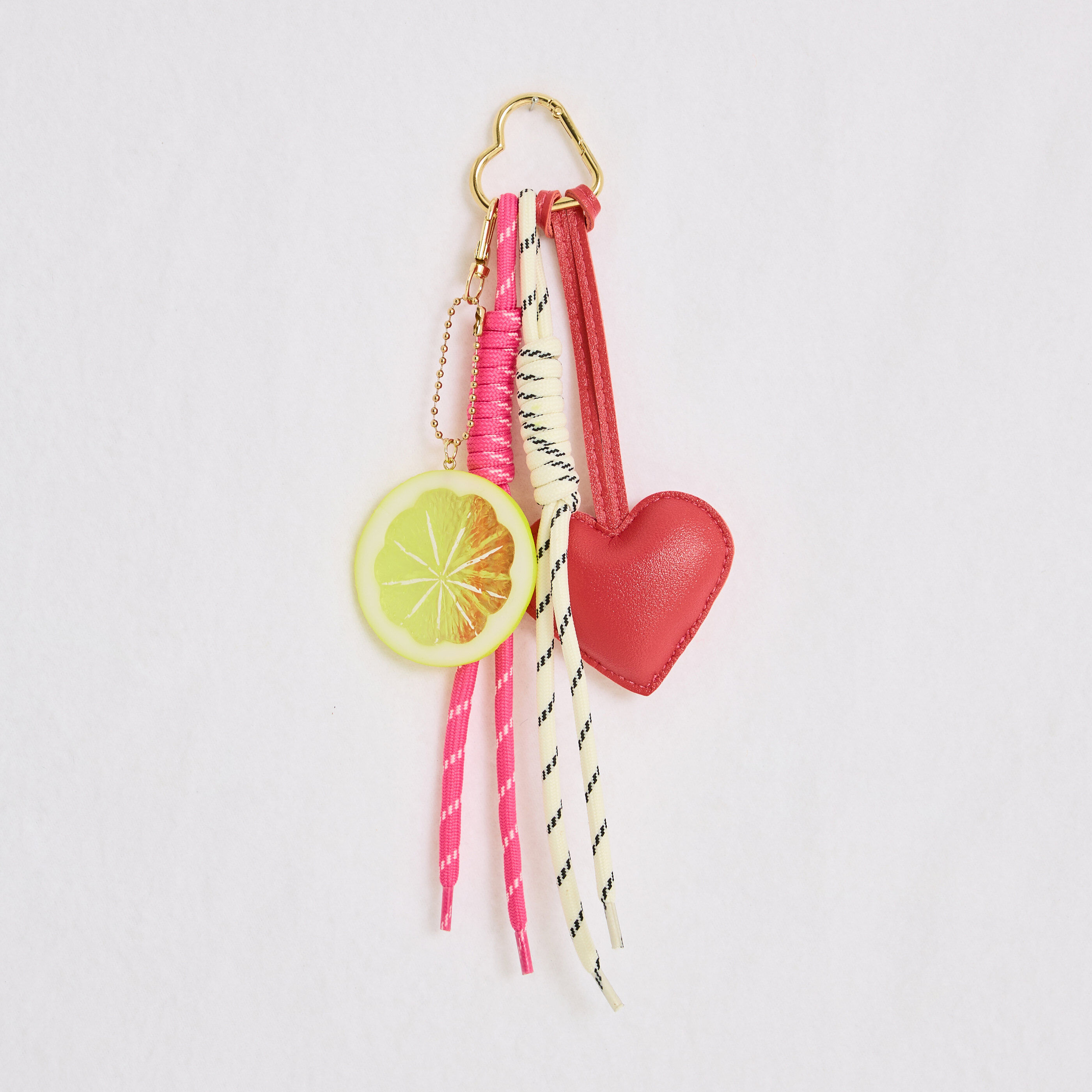 Grigri de sac forme c&oelig;ur et citron femme