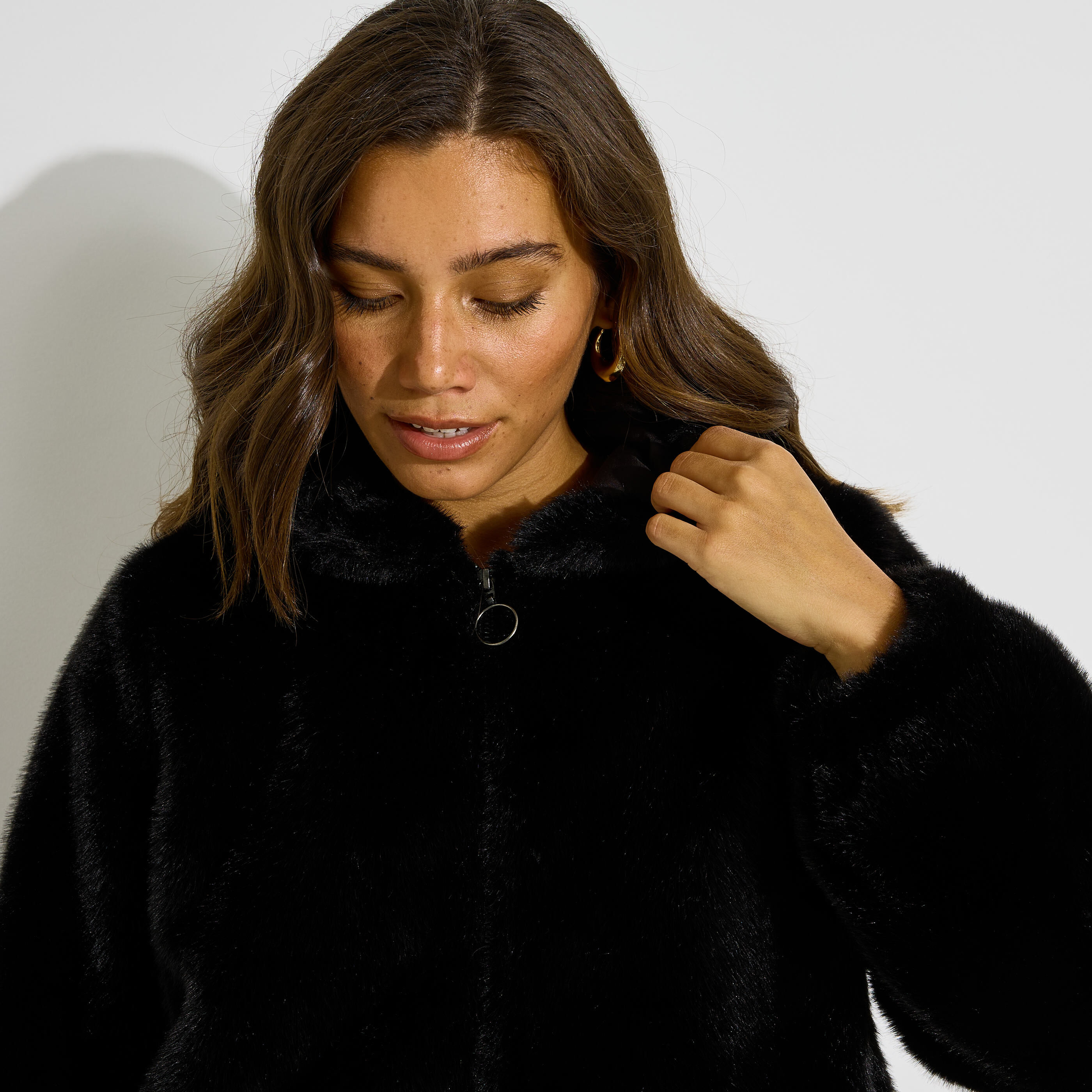 Manteau court imitation fourrure femme