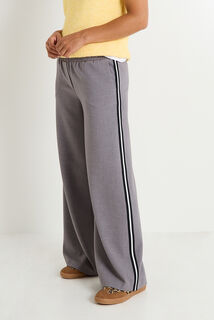 Pantalon avec bandes sur le côté femme