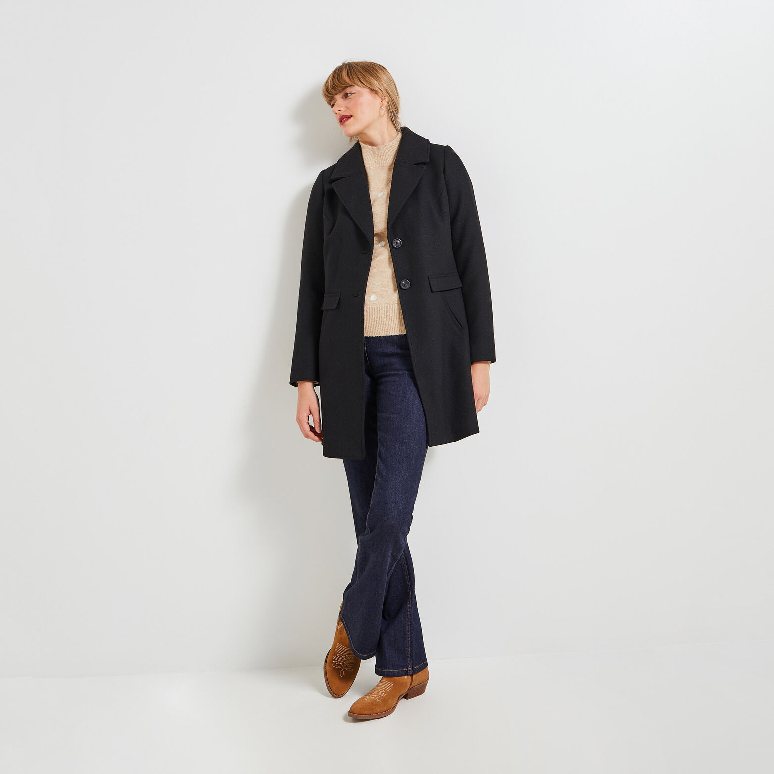 Manteau par-dessus femme