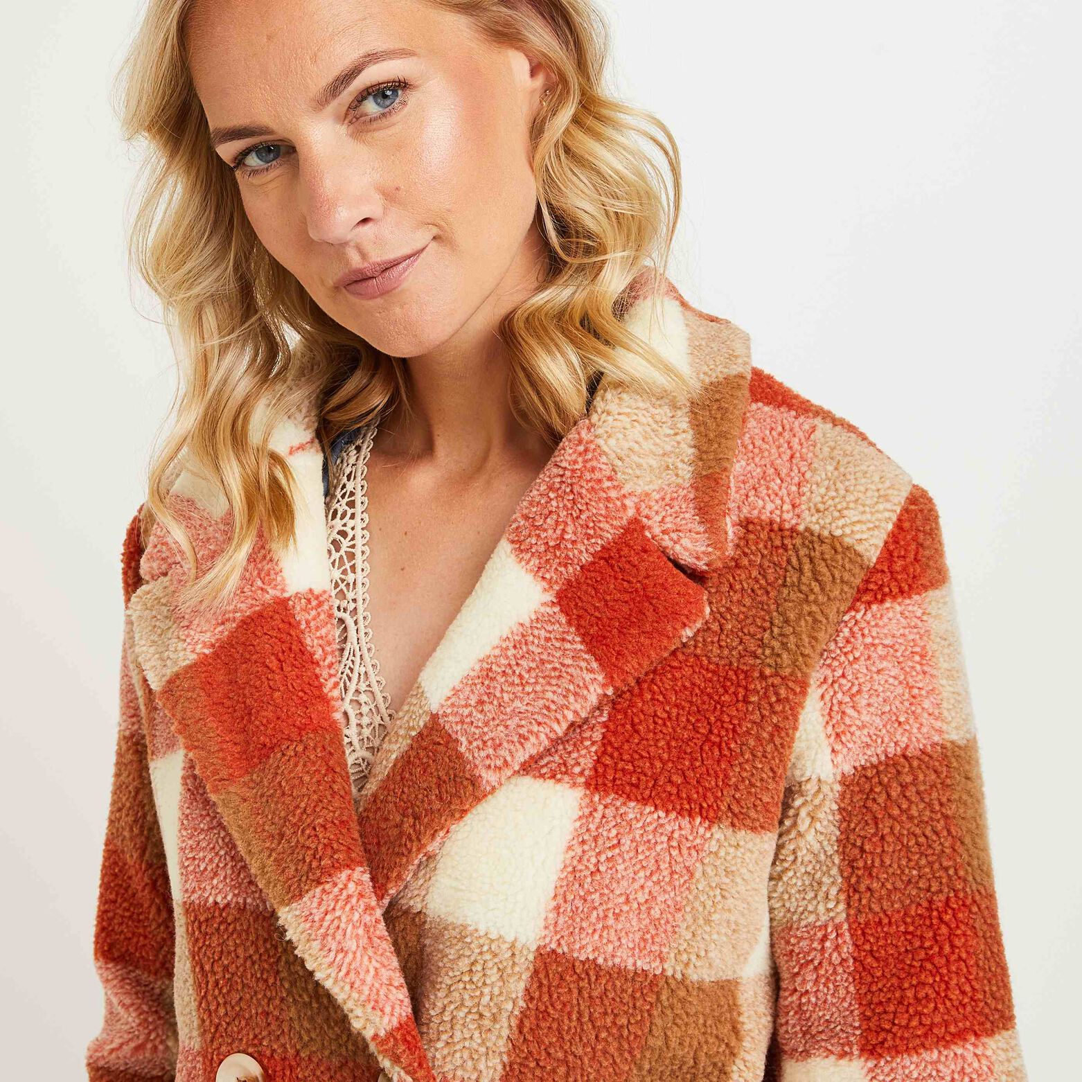 Manteau à carreaux femme