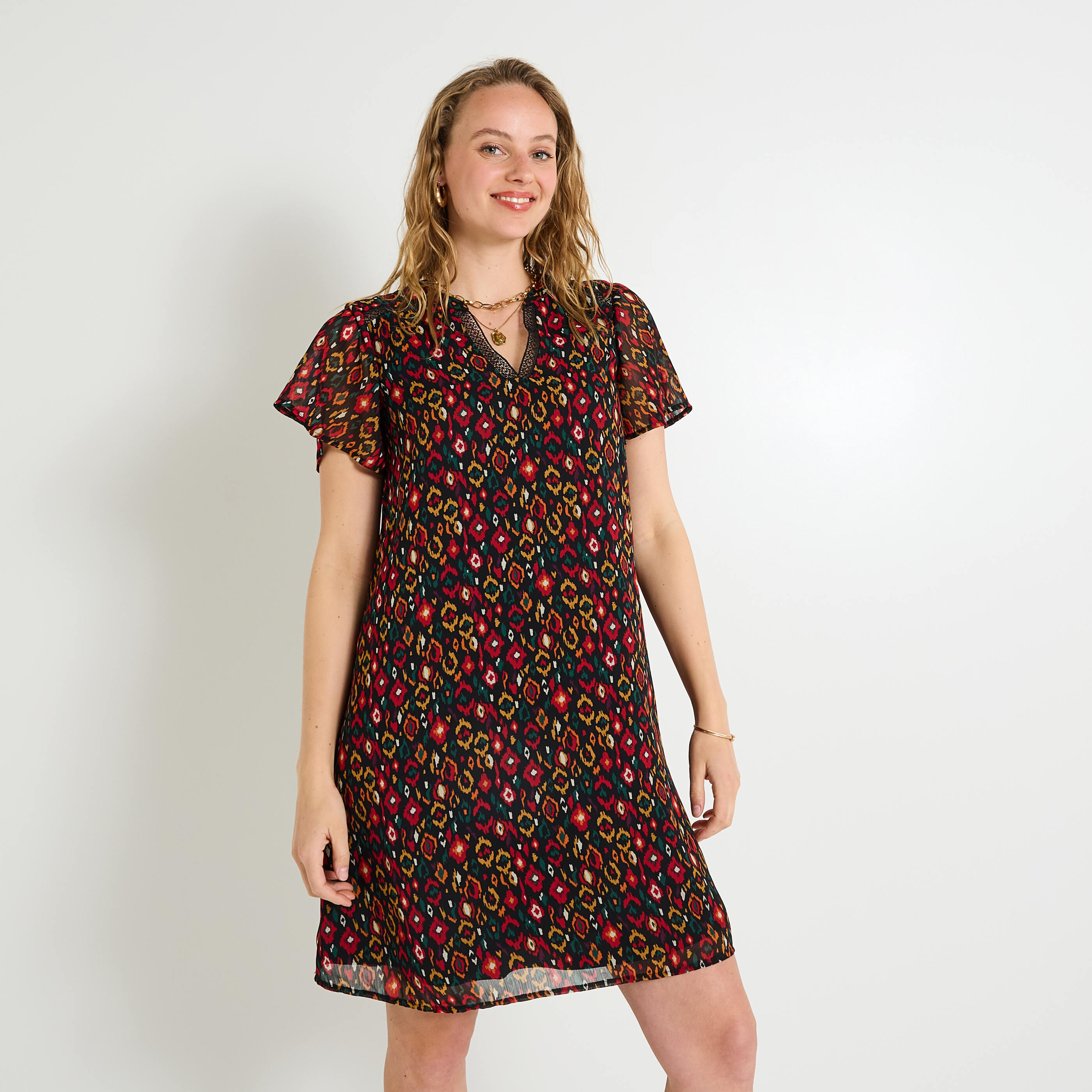 Robe longueur genou imprim&eacute;e col V