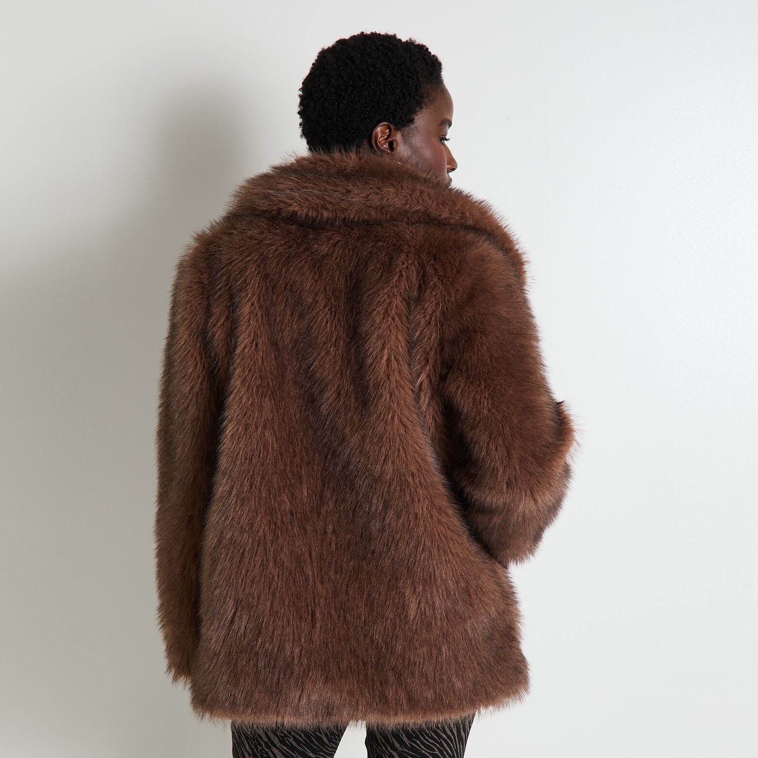 Manteau imitation fourrure femme