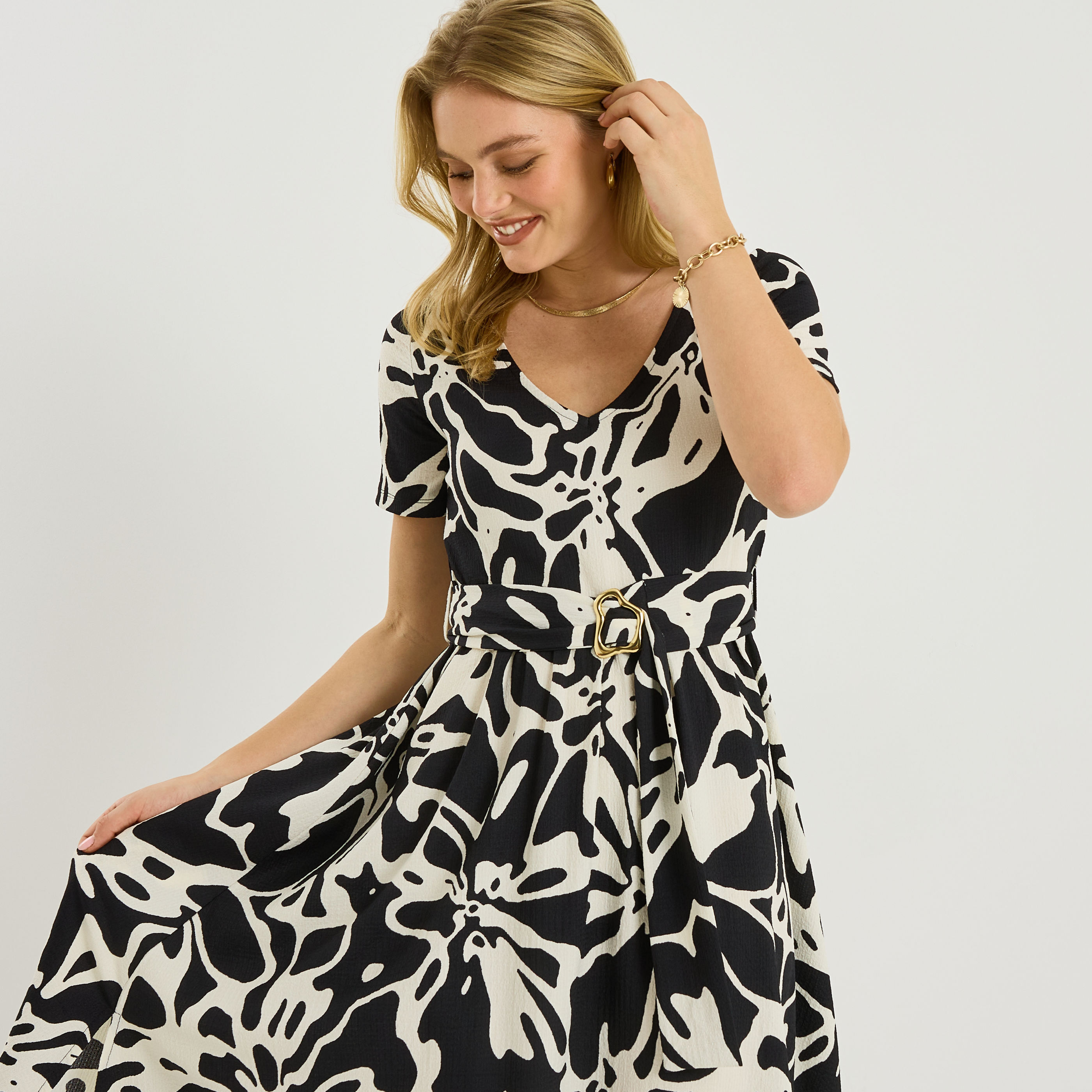 Robe longue &eacute;vas&eacute;e en maille imprim&eacute;e